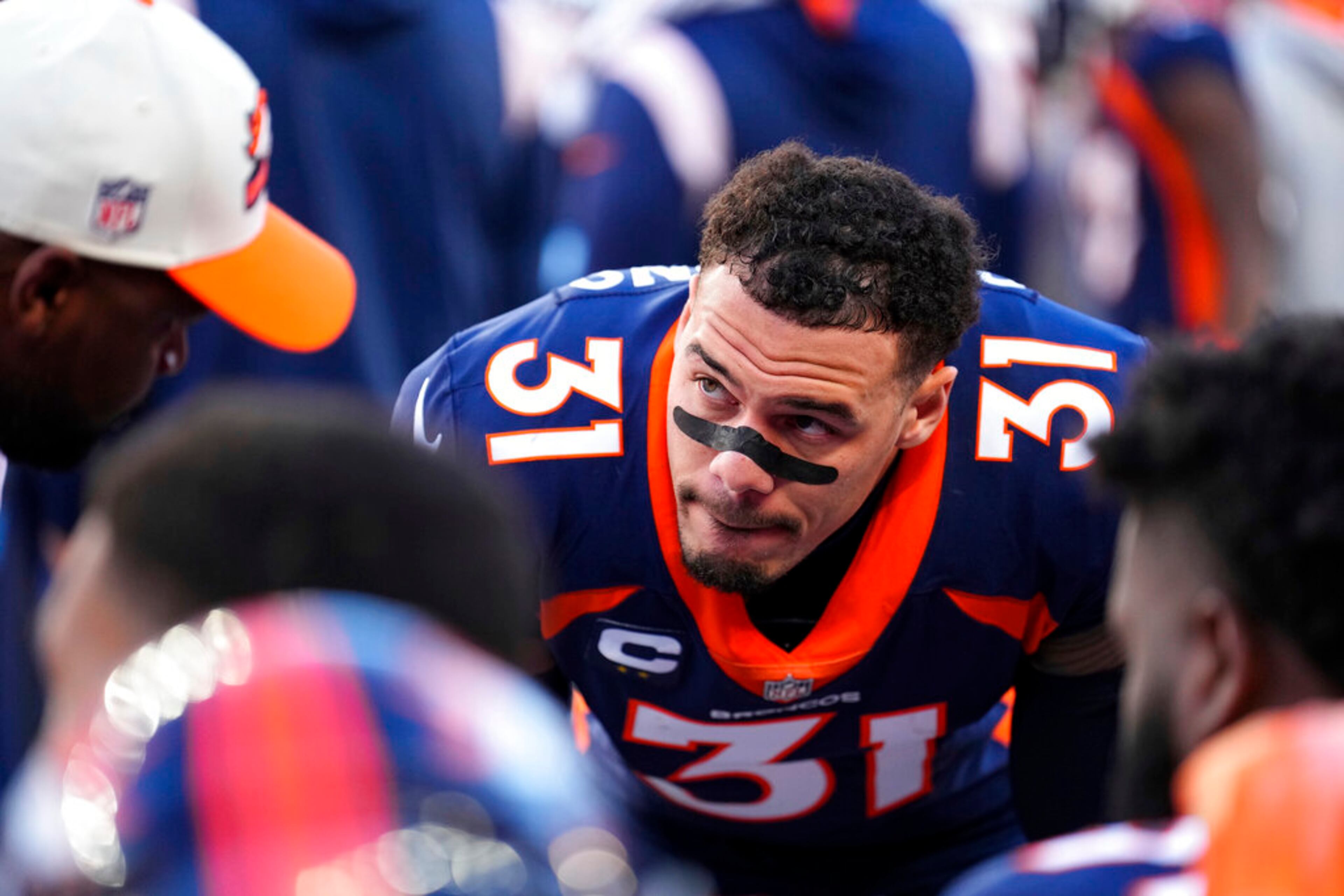 Denver Broncos safety Justin Simmons (31) looks on against the Kansas City Chiefs during the first half of an NFL football game, Sunday, Dec. 11, 2022, in Denver. (AP Photo/Jack Dempsey)