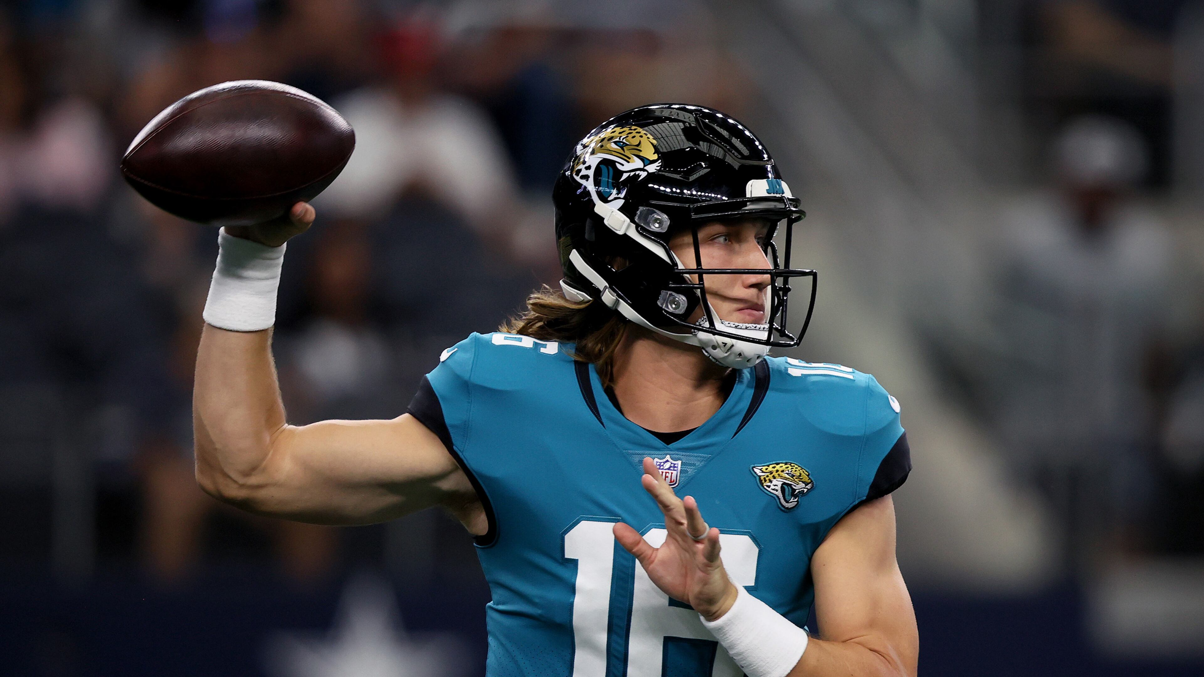 Quarterback Trevor Lawrence (16) of the Jacksonville Jaguars looks for an open receiver against the Dallas Cowboys in the first quarter of an NFL preseason game at AT&T Stadium on Sunday, August 29, 2021 in Arlington, Texas. (Tom Pennington/Getty Images/TNS)