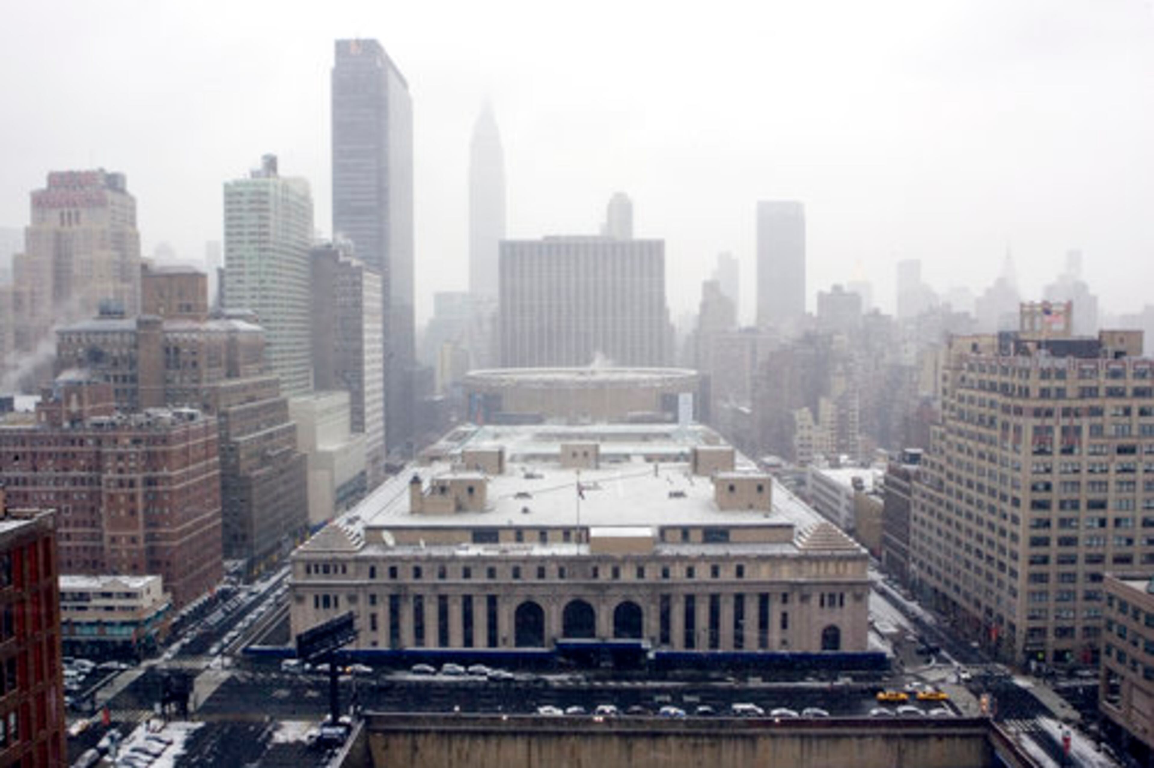 Snow begins to fall in New York, Sunday, Dec. 26, 2010.