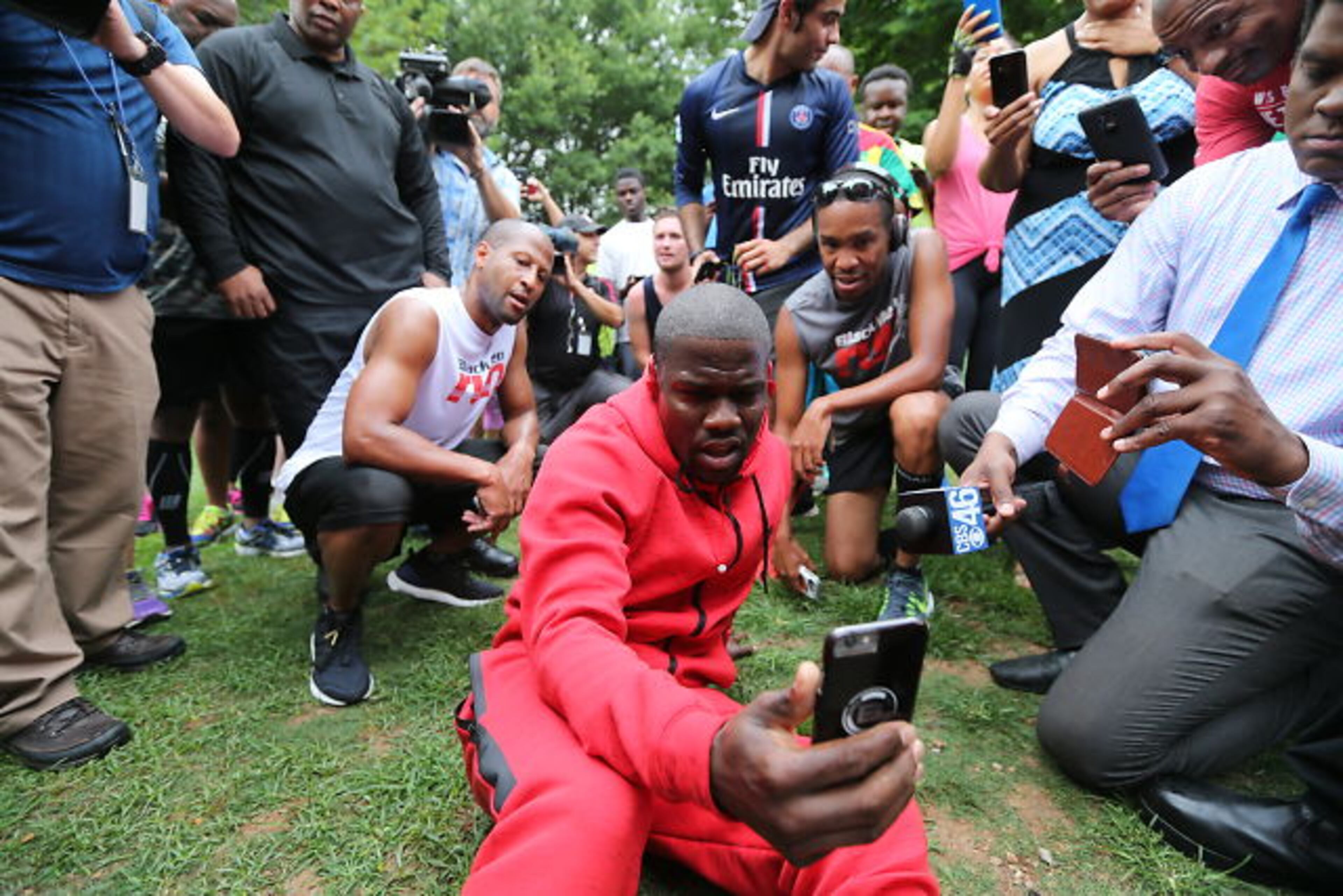 Hundreds of people came to Piedmont Park Fri., June 12, 2015, to run with comedian Kevin Hart. Hart announced the last-minute run on Twitter. JOHN SPINK / JSPINK@AJC.COM