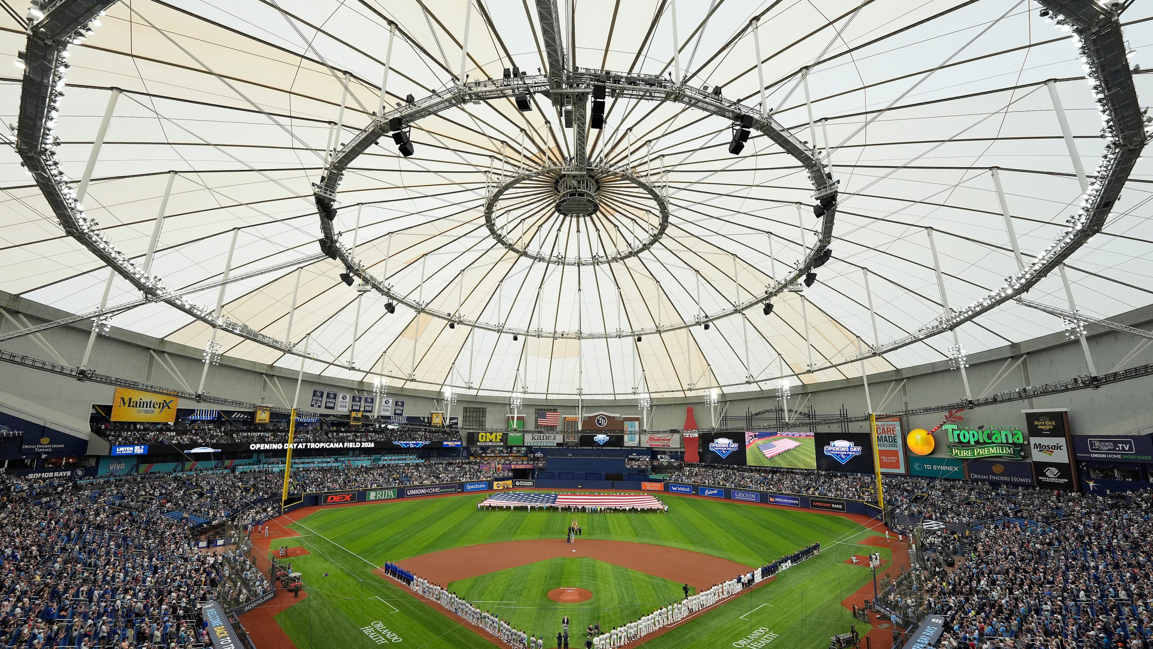 FILE - Players from the Chicago Cubs and Tampa Bay Rays are introduced before a baseball game Monday, April 6, 2026, in St. Petersburg, Fla. (AP Photo/Chris O'Meara, File)