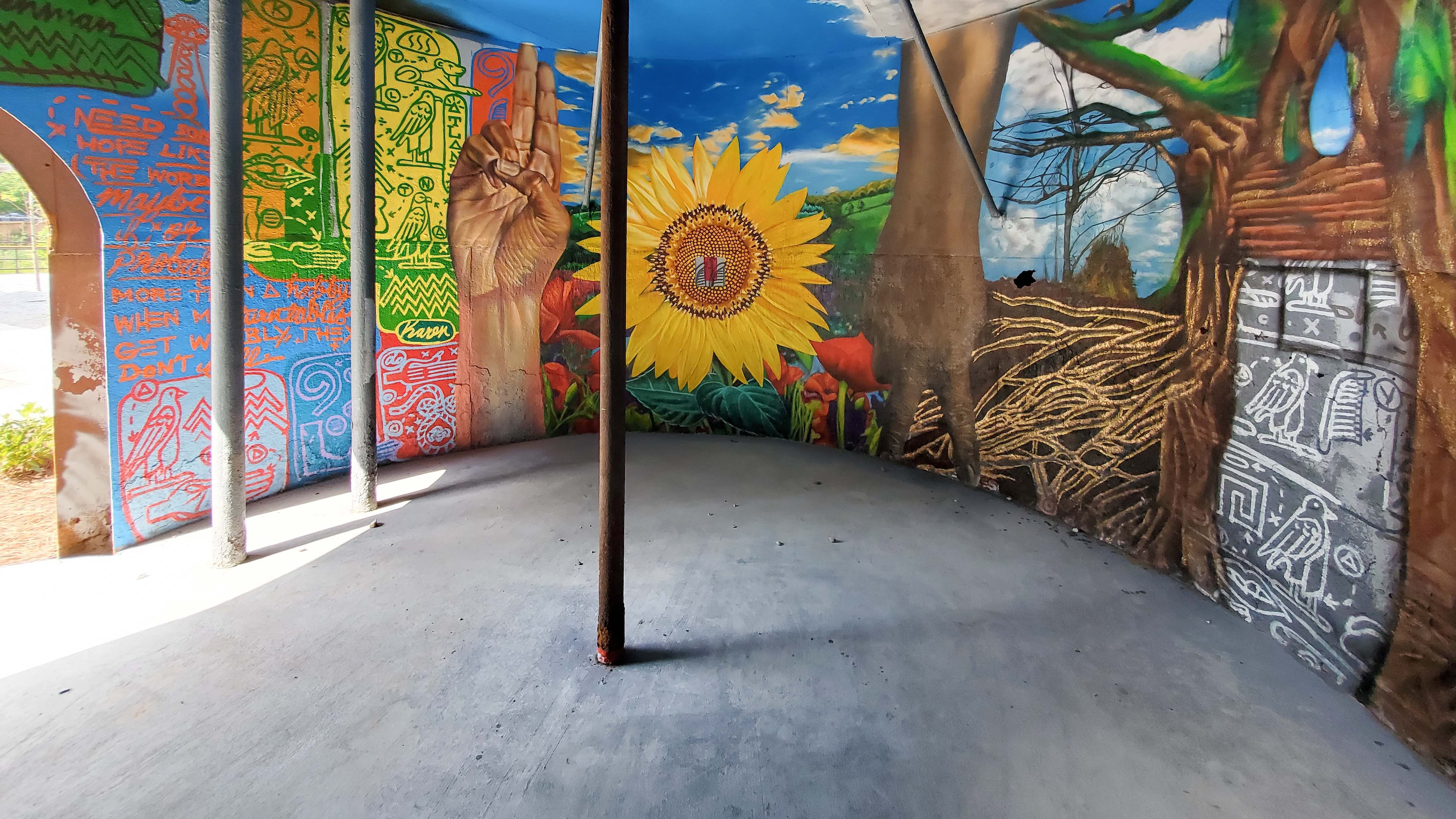 Fabian Williams and Karen Anderson Singer (of Tiny Doors Atlanta) created this in-the-round mural in an old building that developers saved when clearing land for the Penman Apartments in Grant Park. Courtesy of Arthur Rudick