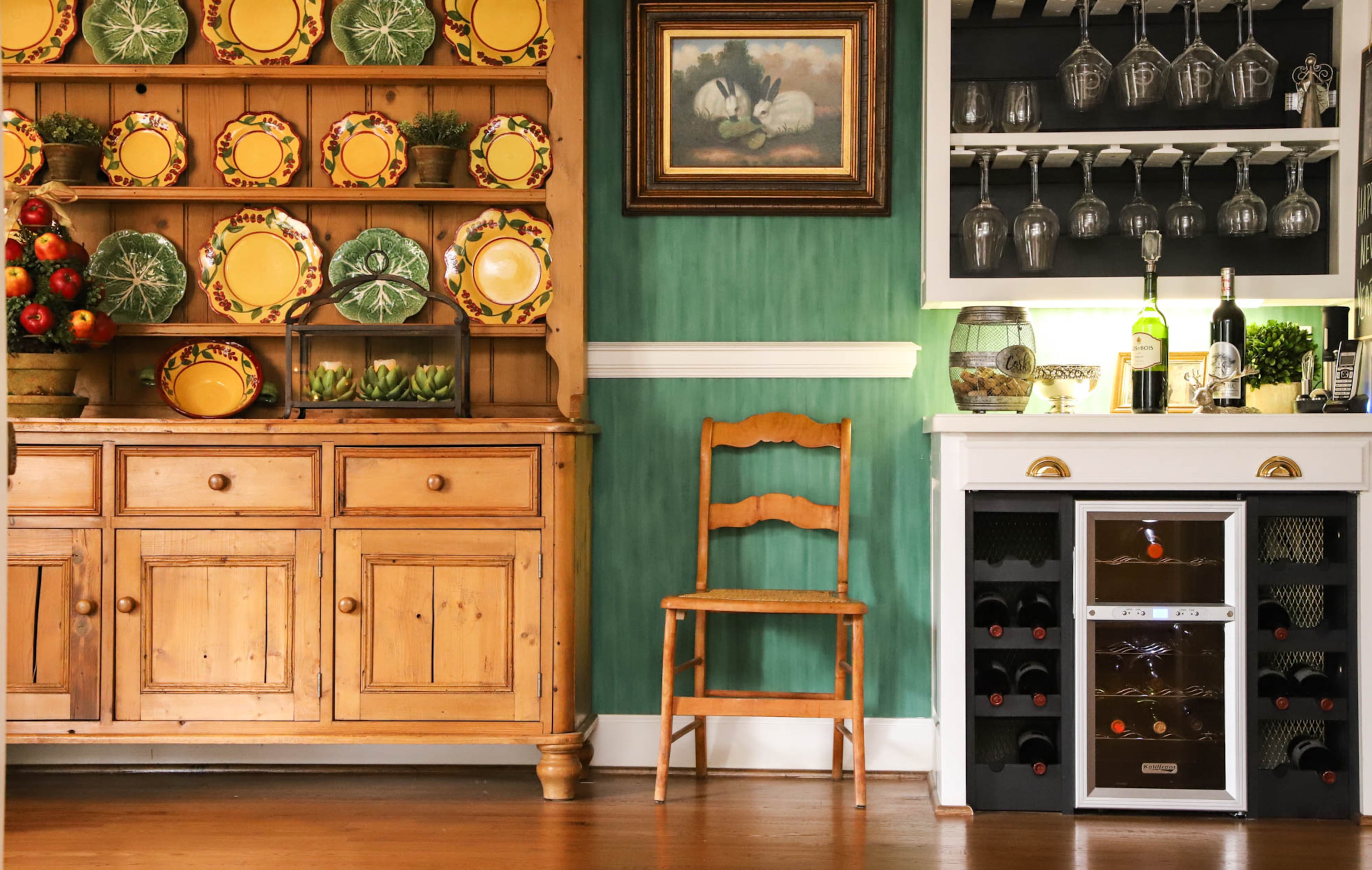 Leo and Jane Carlton fashioned the wine bar in their breakfast room from a desk. Now the space includes plenty of storage for bottles and glasses in a compact space that allows them to elegantly serve guests and themselves. Text by Shannon Dominy/Photo by Reynolds Rogers
