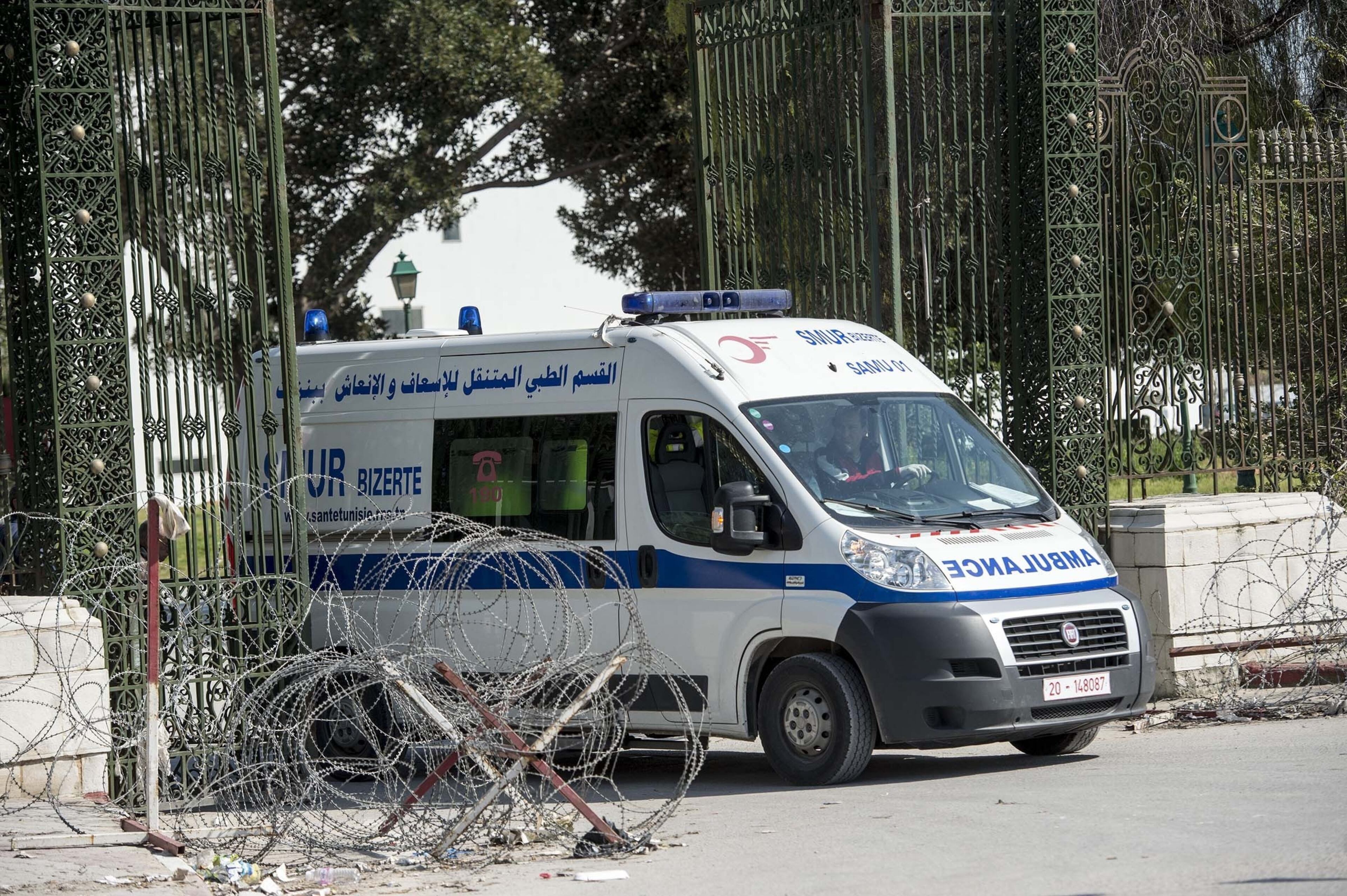 TUNIS, TUNISIA - MARCH 18: An ambulance evacuating woundeds from the National Bardo Museum, near the country's parliament in Tunis, when gunmen take an unknown number of tourists hostage on Wednesday, March 18, 2015. At least eight people, including six foreign tourists, were killed in the attack by unidentified gunmen on the museum in the Tunisian capital, the Interior Ministry said Wednesday. (Photo by Ahmet Izgi/Anadolu Agency/Getty Images)
