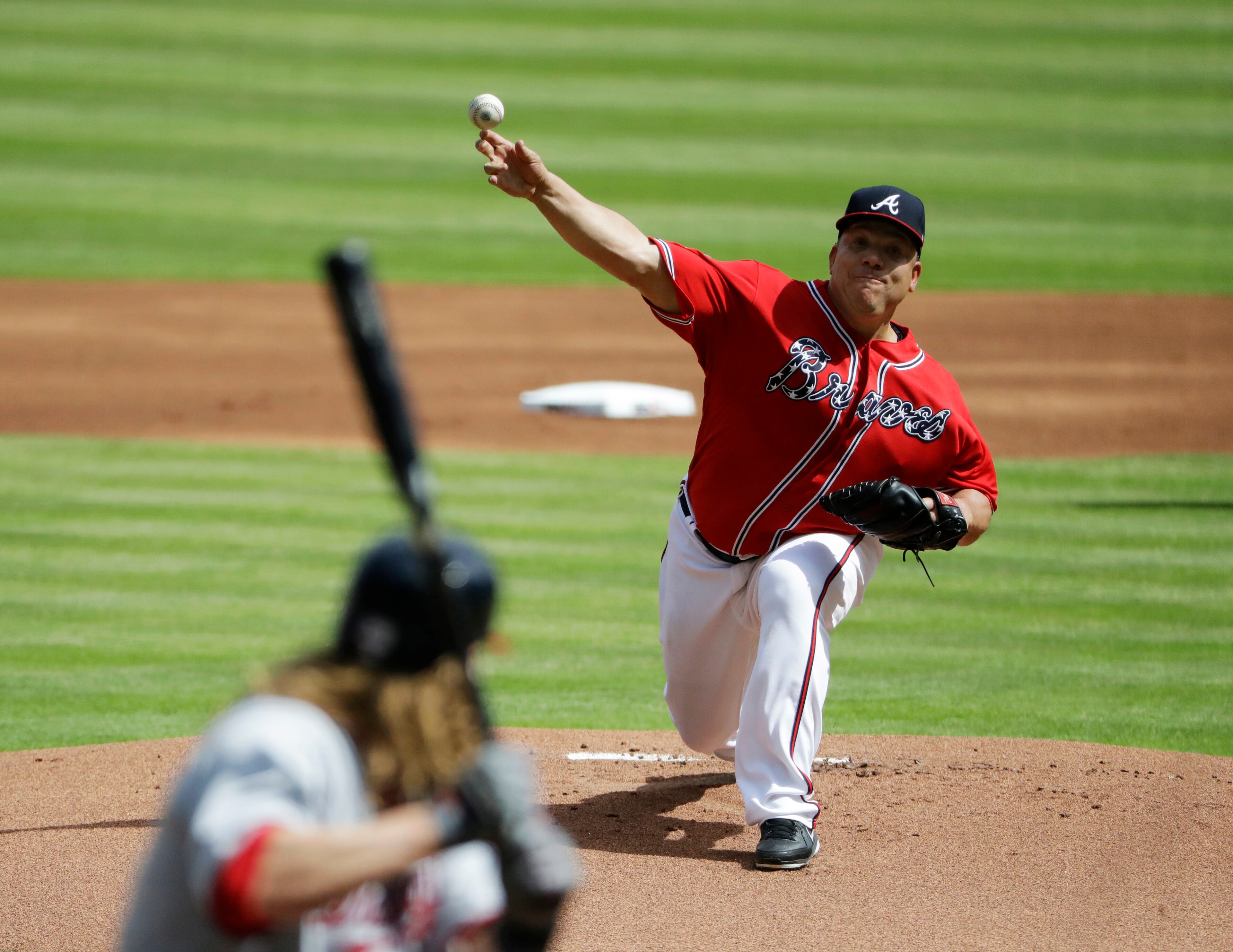 Atlanta Braves starting pitcher Bartolo Colon throws to Washington Nationals' Jayson Werth in the first inning of a baseball game in Atlanta, Saturday, May 20, 2017. (AP Photo/David Goldman)