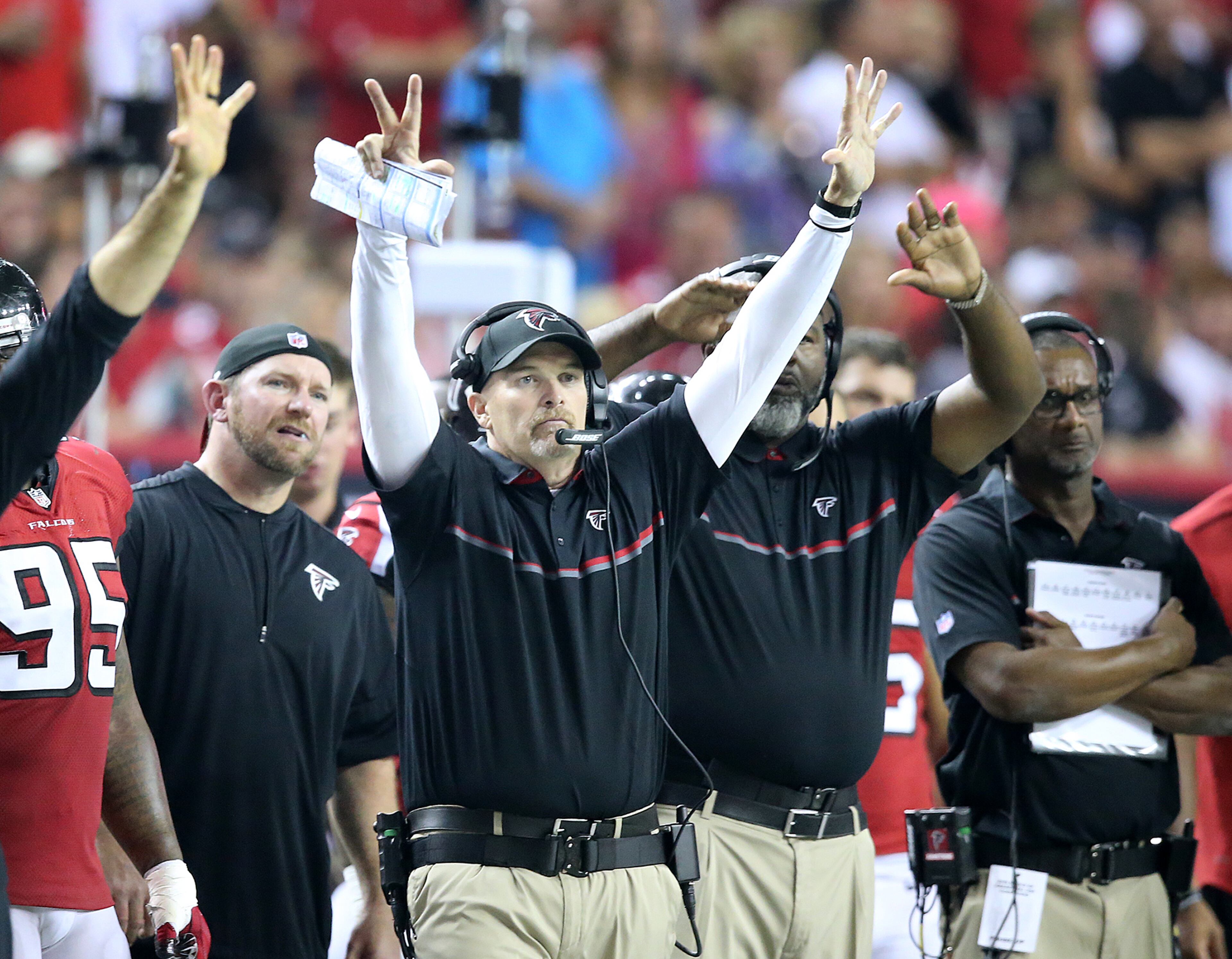 October 30, 2016 ATLANTA: Falcons head coach Dan Quinn calls a defense against the Packers during the fourth quarter in an NFL football game on Sunday, Oct. 30, 2016, in Atlanta. Curtis Compton /ccompton@ajc.com