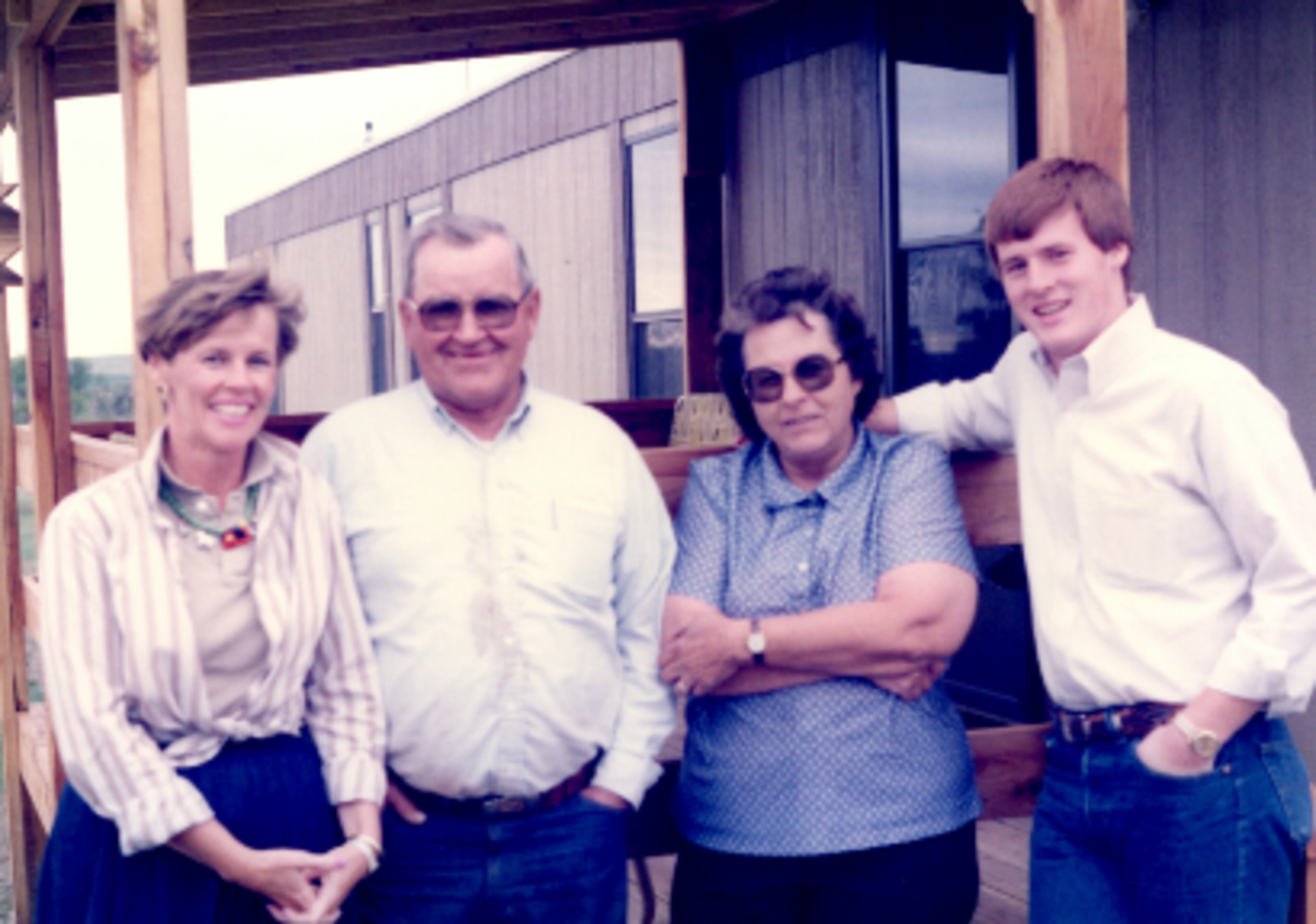 Your author on the right, my mother on the left; Floyd and Carrie Workman in the middle