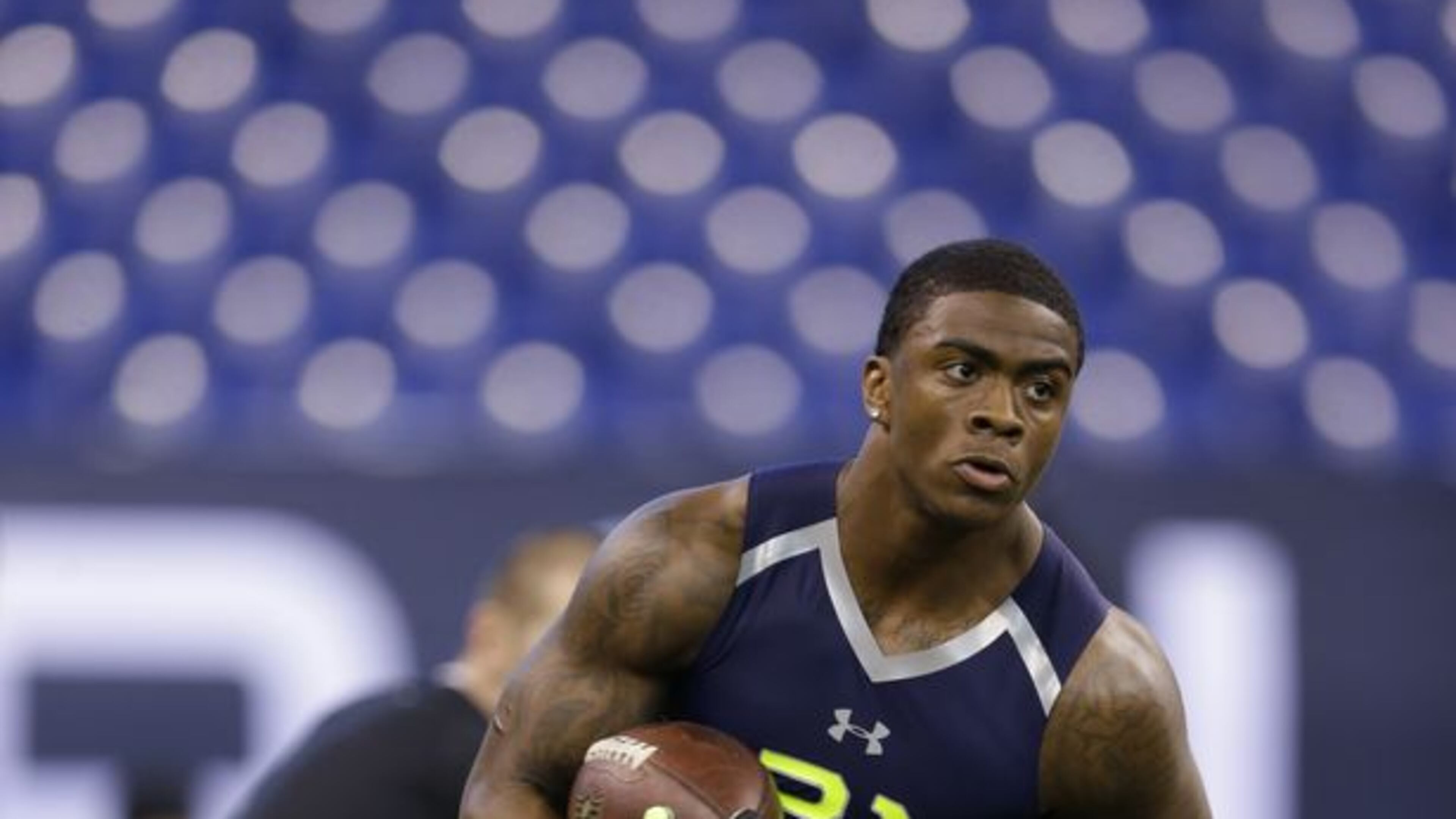 Georgia Southern running back Jerick Mckinnon, who went to Sprayberry High, runs a drill at the NFL football scouting combine in Indianapolis, Sunday, Feb. 23, 2014. (AP Photo/Michael Conroy)
