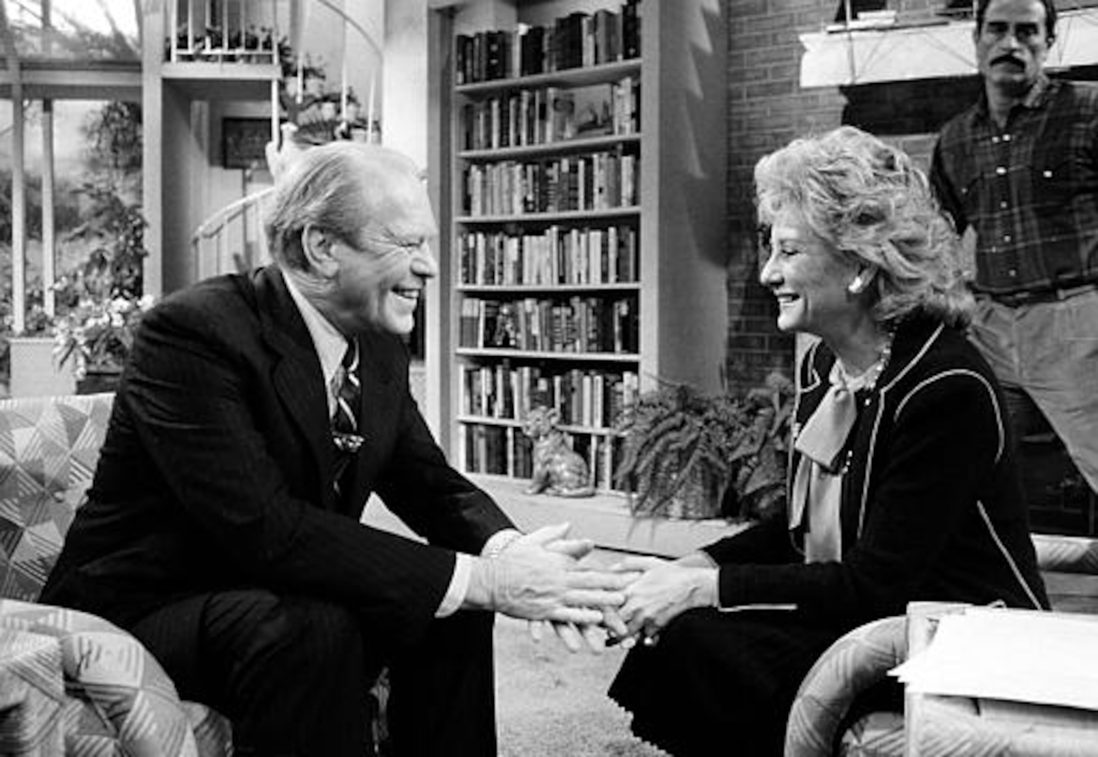 Former U.S. President Gerald Ford, left, is shown with reporter Barbara Walters following their interview on ABC's "Good Morning America" television show in New York City, Tuesday, Jan. 24, 1984. (AP Photo/David Bookstaver)