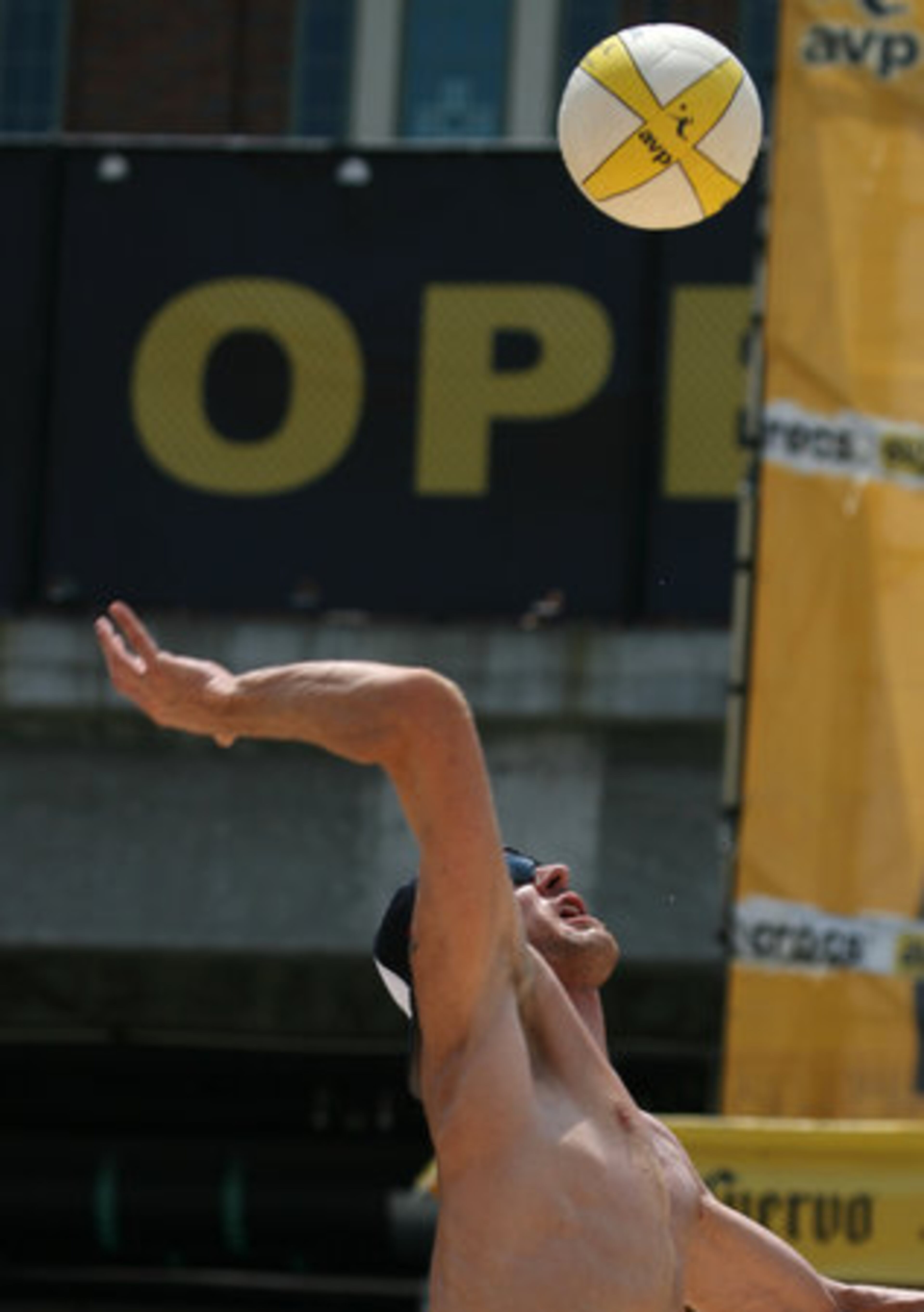 Gibb serves in the men's final.