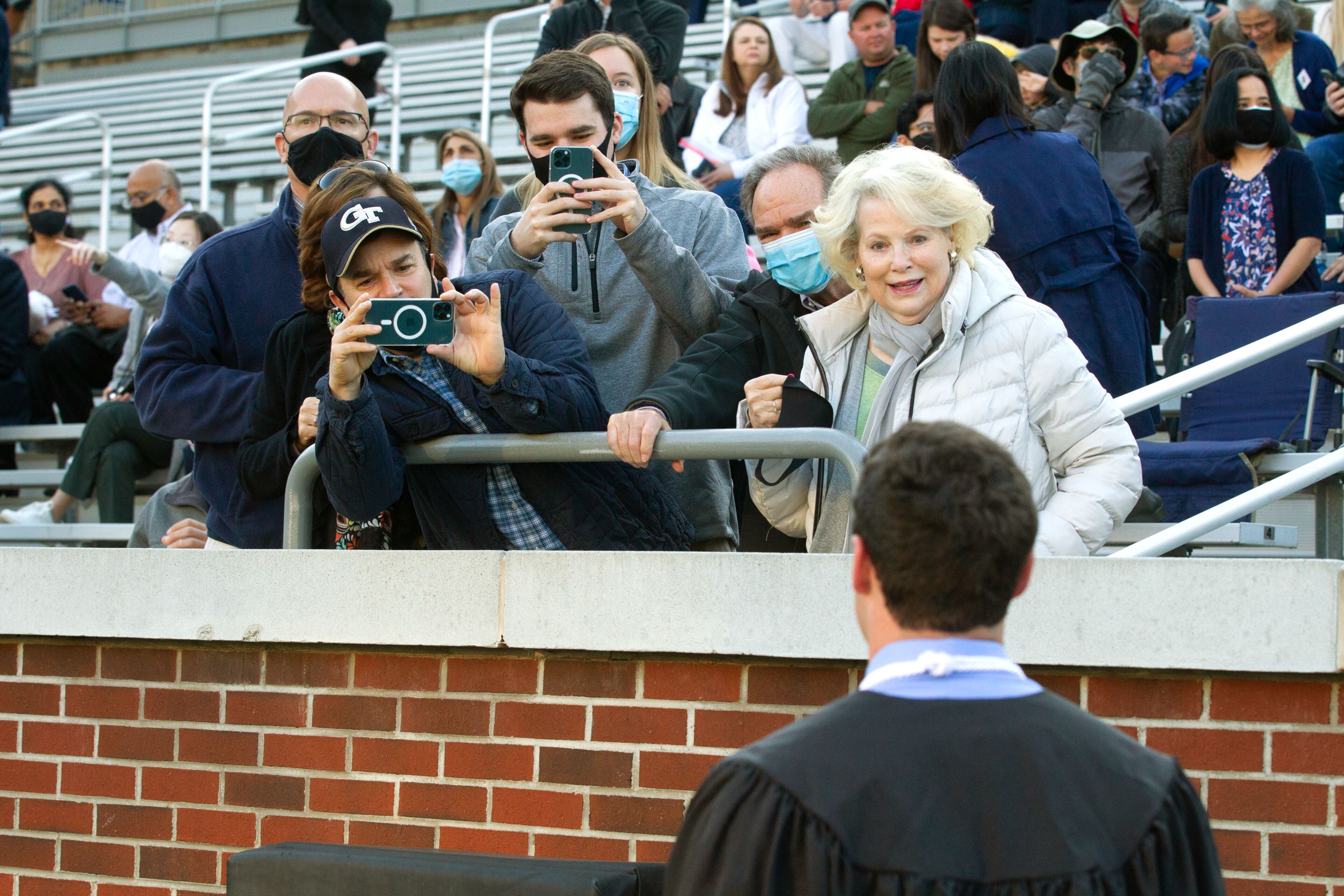 Ryan Zweber's family takes photographs of him before the start of the Georgia Tech 2021 commencement ceremony in Bobby Dodd Stadium on Saturday, May 8, 2021. Two ceremonies were held Saturday for bachelor’s degree recipients, and master's and doctoral graduates' ceremonies were held Friday. (Photo: Steve Schaefer for The Atlanta Journal-Constitution)
