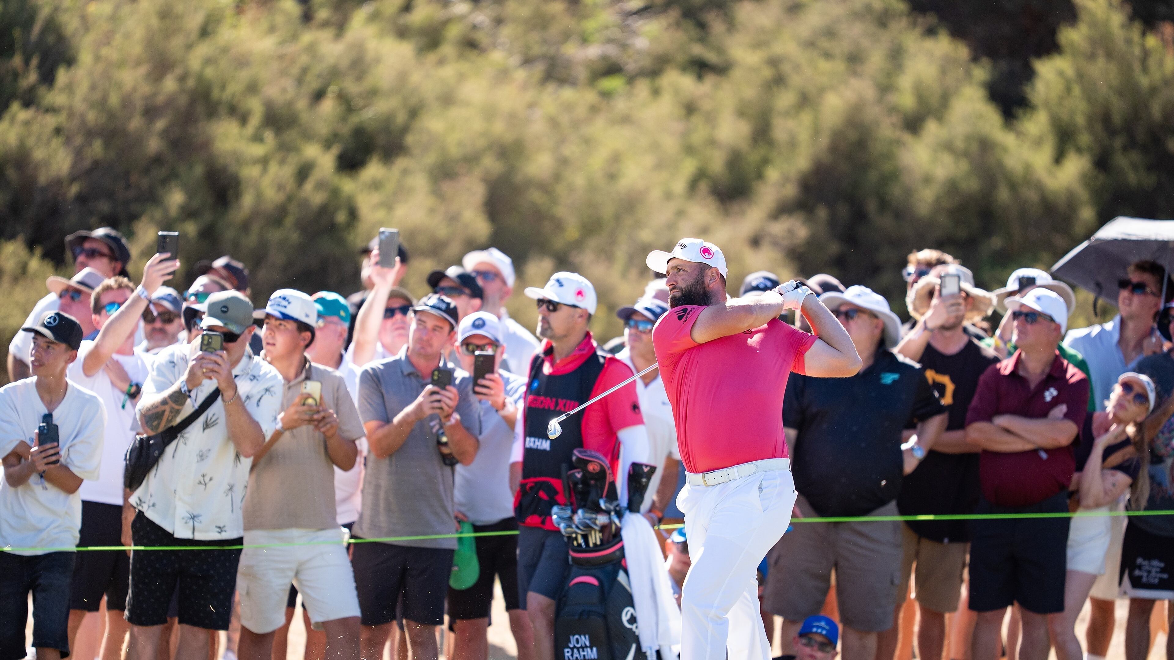 Captain Jon Rahm of Legion XIII hits his shot from the 13th fairway during the third round of the LIV Golf tournament at Grange Golf Club, Saturday, Feb 14, 2026 in Adelaide, Australia. (Mateo Villalba/LIV Golf via AP)