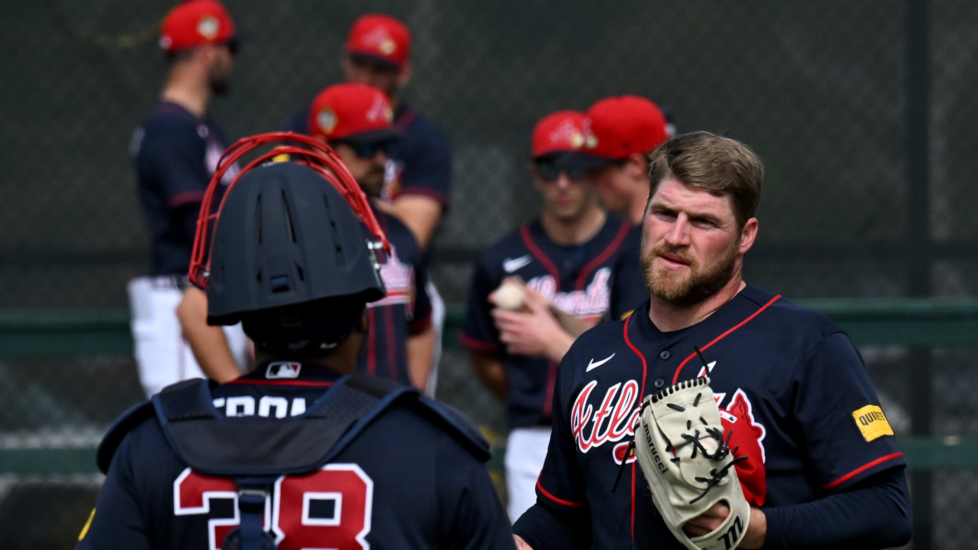Braves pitcher Bryce Elder (right) — pictured talking to catcher Chadwick Tromp during spring training workouts in February — allowed five earned runs on six hits and three walks Sunday, March 8, 2026, against the Rays. (Hyosub Shin/AJC)