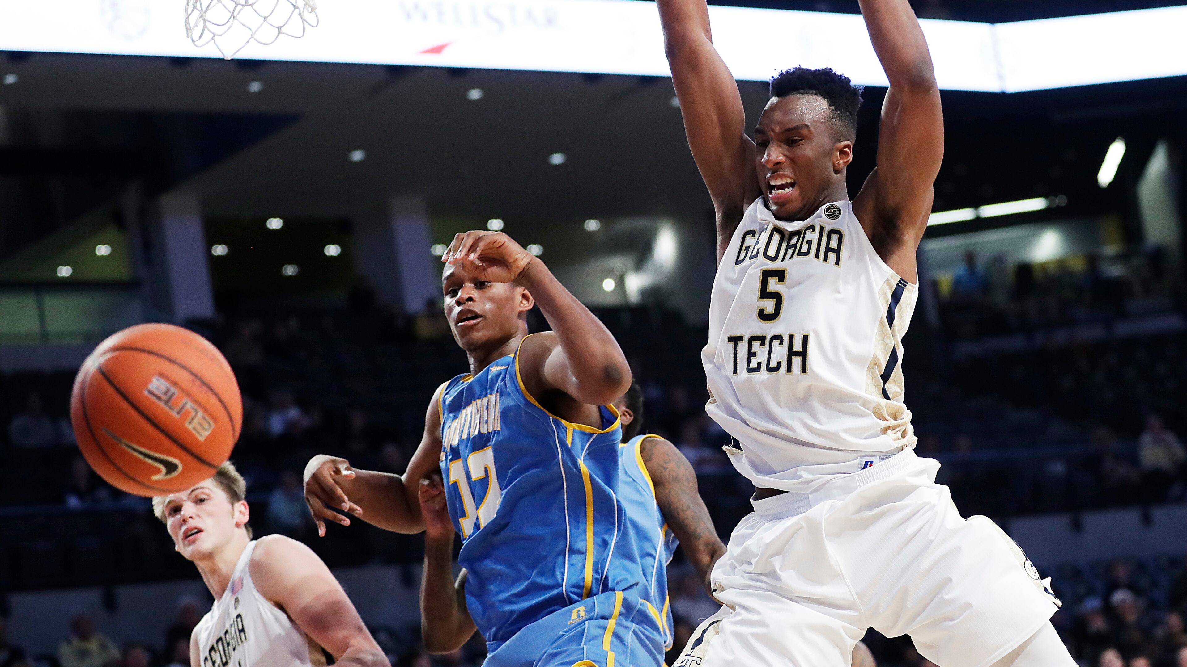 Georgia Tech’s Josh Okogie, right, plays against Southern’s Jared Sam (12) in the second half of an NCAA college basketball game in Atlanta, Monday, Nov. 14, 2016. (AP Photo/David Goldman)