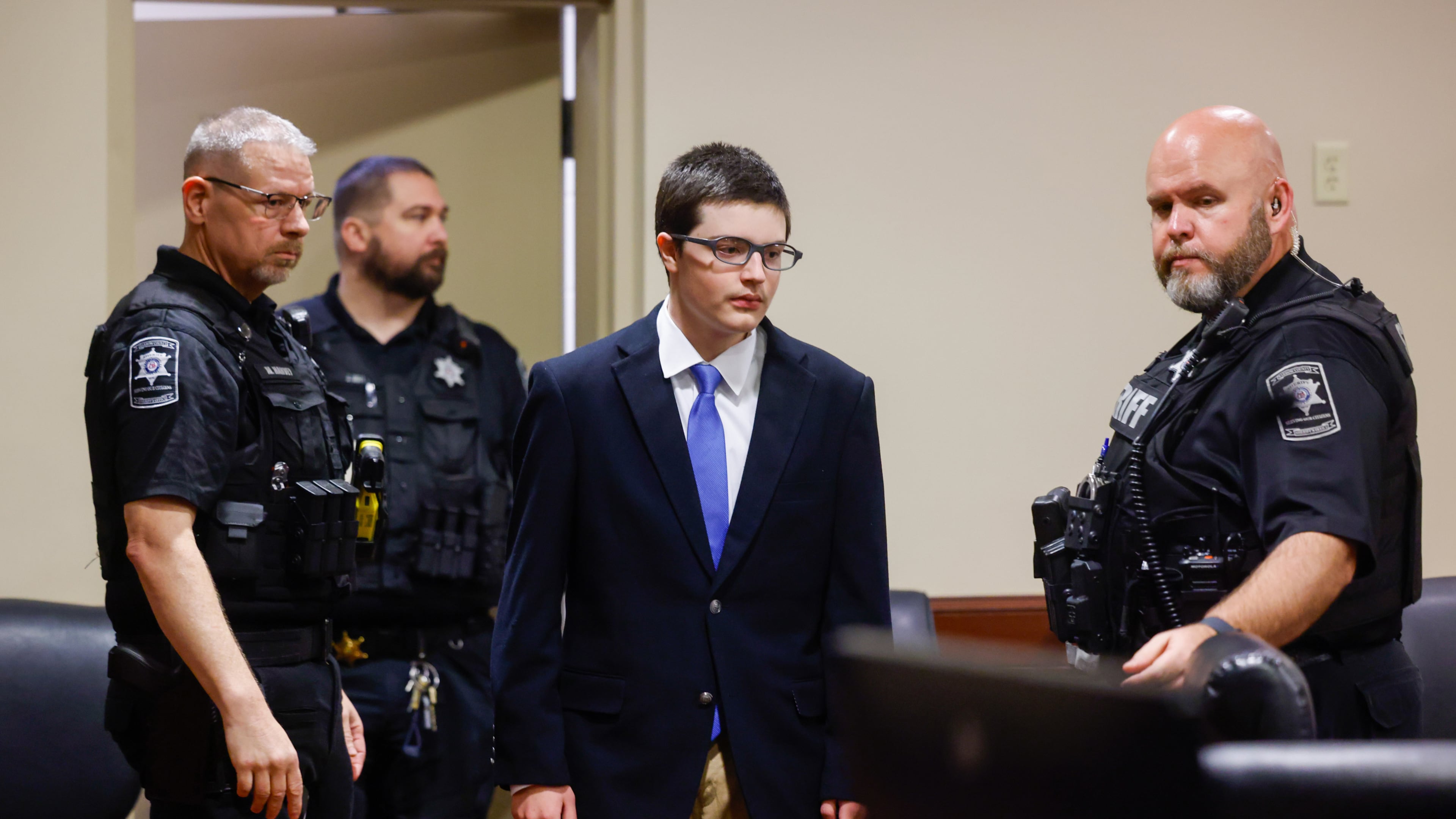 Colt Gray, the 16-year-old Apalachee High School shooting suspect, is led in by deputies for a plea hearing at Barrow County Superior Court in Winder, Ga., on Friday, July 24, 2026. (Arvin Temkar/Atlanta Journal-Constitution via AP)