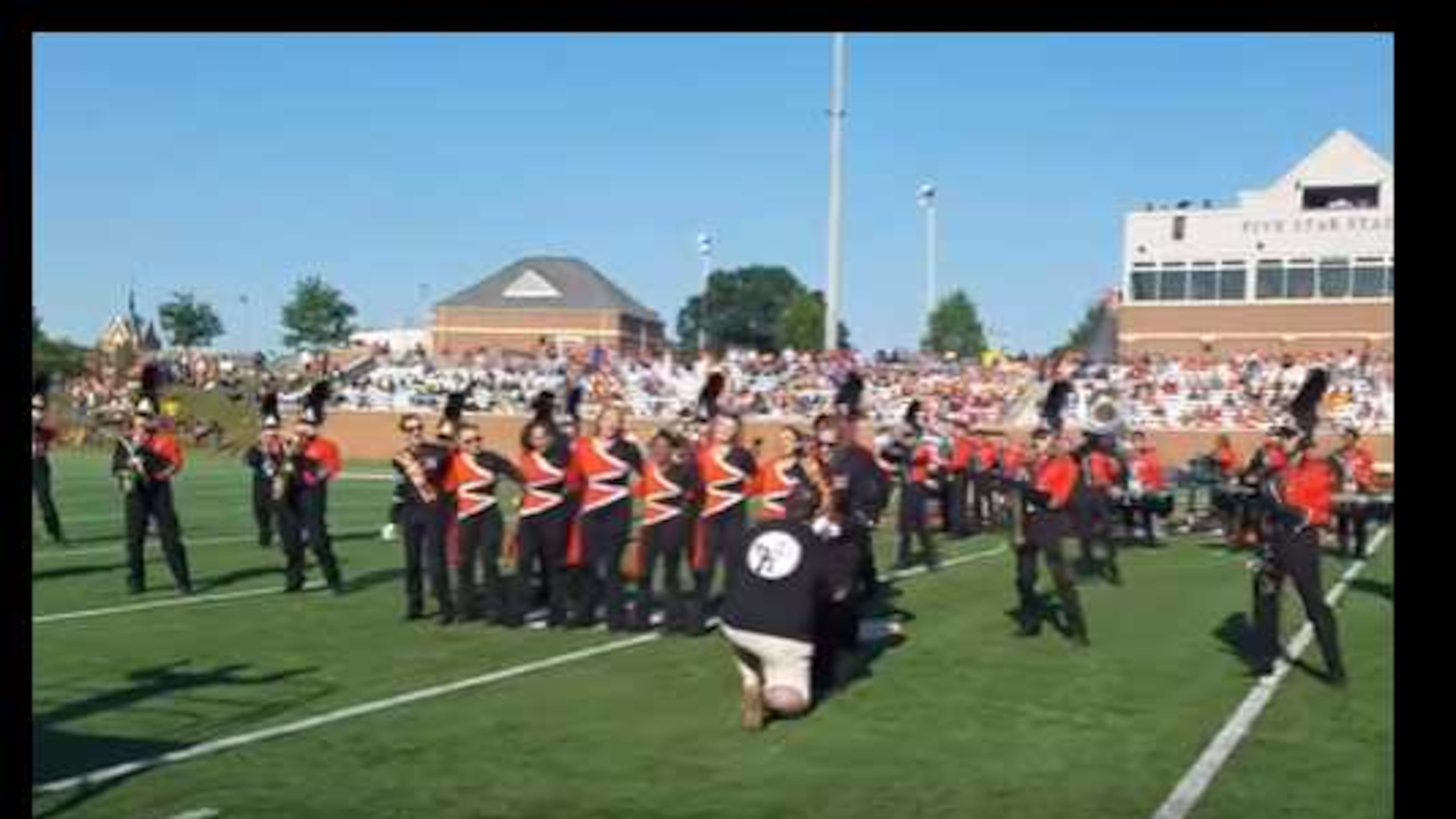 A Mercer band major from Marietta was surprised by her Alpharetta boyfriend's proposal at halftime on the football field.