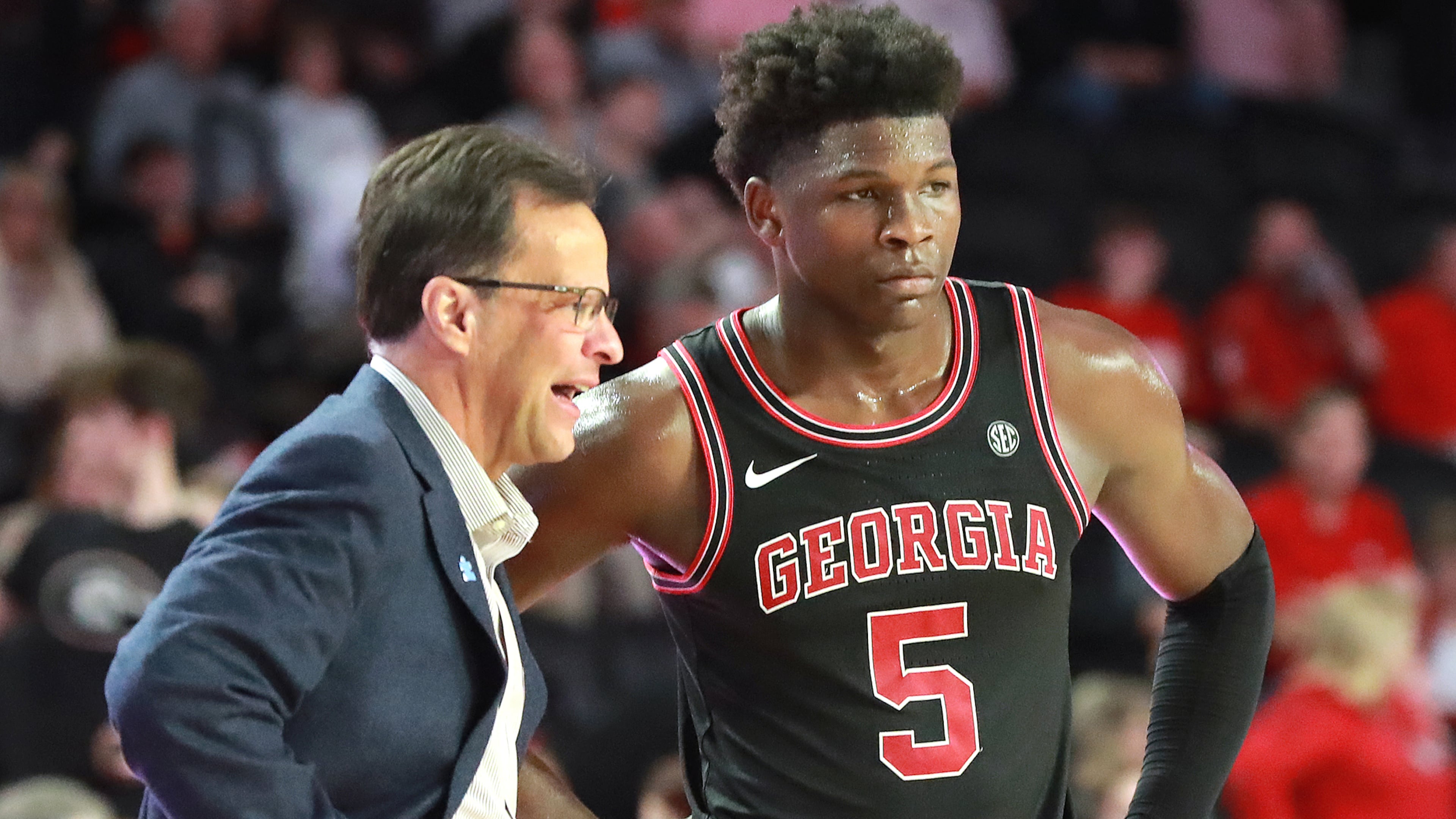 Georgia head coach Tom Crean confers with guard Anthony Edwards during a 63-48 victory over Texas A&M Saturday, Feb. 1, 2020, in Athens. (Curtis Compton ccompton@ajc.com)