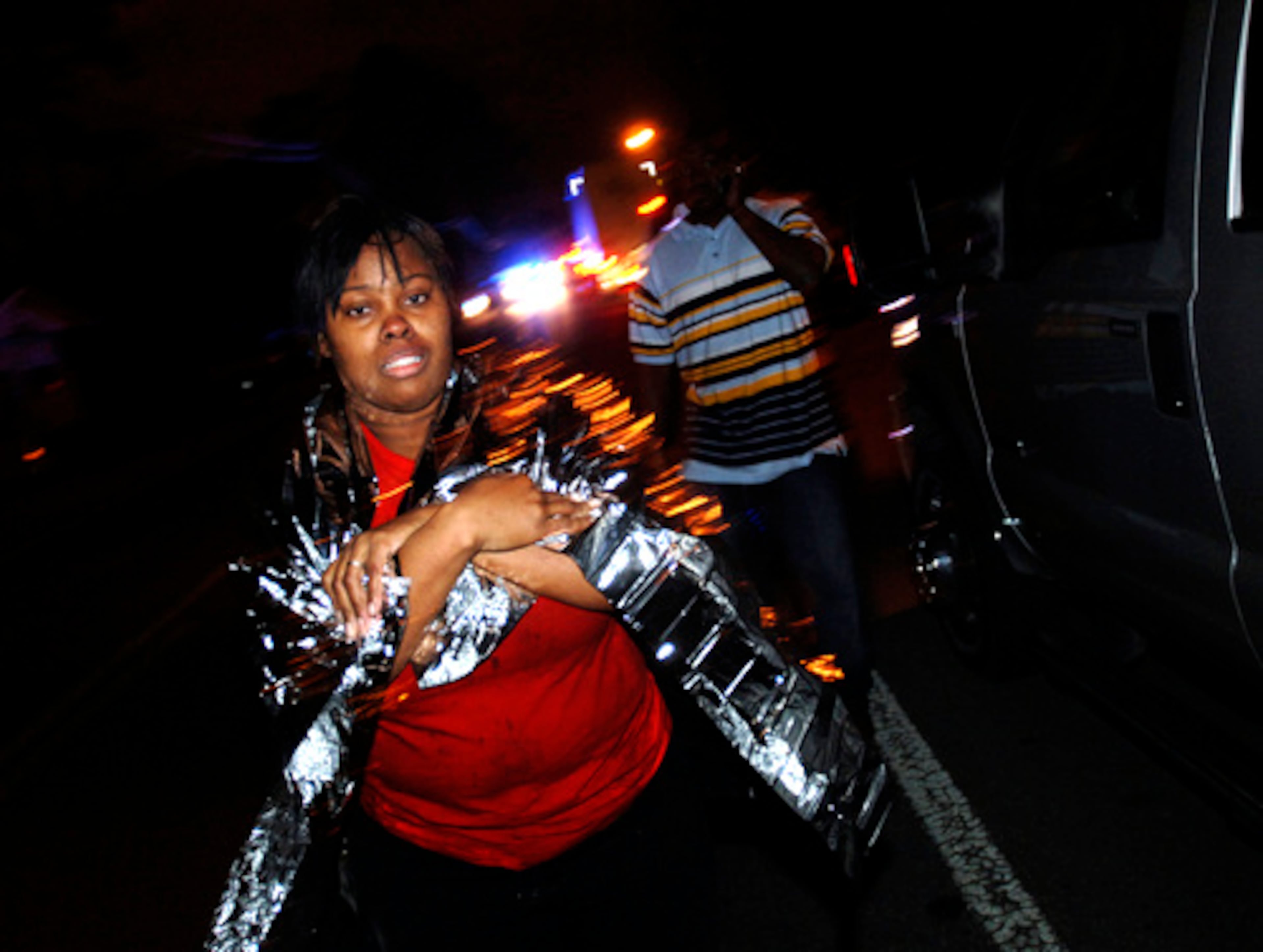 "All I know is, I heard a loud boom and everything came down," said machine operator Nakishya Hill, who was uninjured except for blisters on her elbow. "When I got up, I went down and found a couple of people and we climbed out of there from the third floor to the first floor. Half of the floor was gone. The second floor was debris, the first floor was debris."