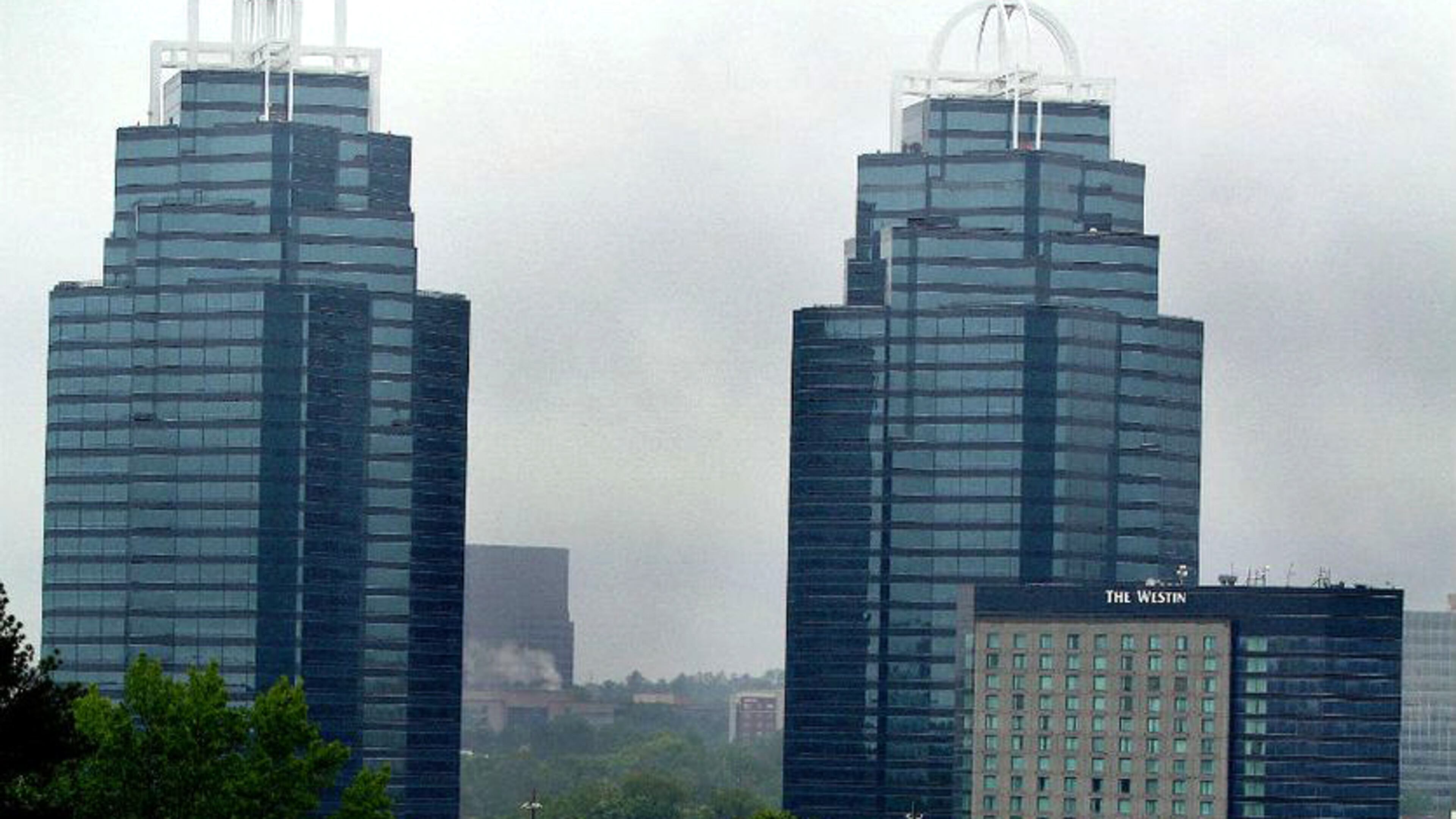 Sandy Springs will work with Dunwoody on two street projects in the Perimeter business district: A new sidewalk on Central Parkway, and a new turn lane at Peachtree Dunwoody Road and Hammond Drive. AJC FILE