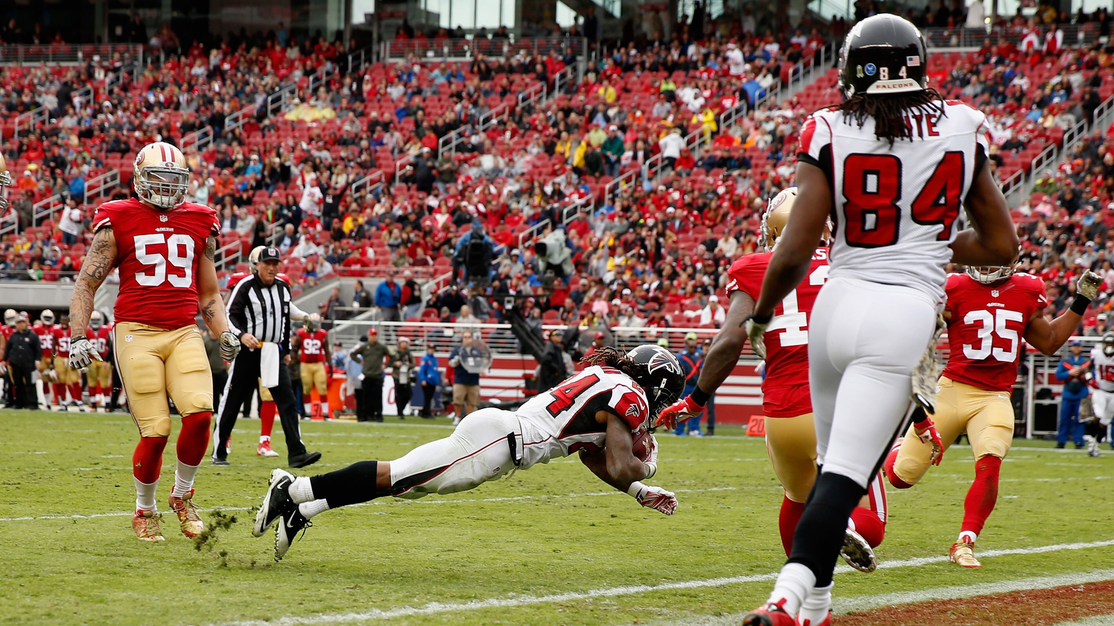 SANTA CLARA, CA - NOVEMBER 08: Devonta Freeman #24 of the Atlanta Falcons dives in for a touchdown against the San Francisco 49ers at Levi's Stadium on November 8, 2015 in Santa Clara, California. (Photo by Ezra Shaw/Getty Images)