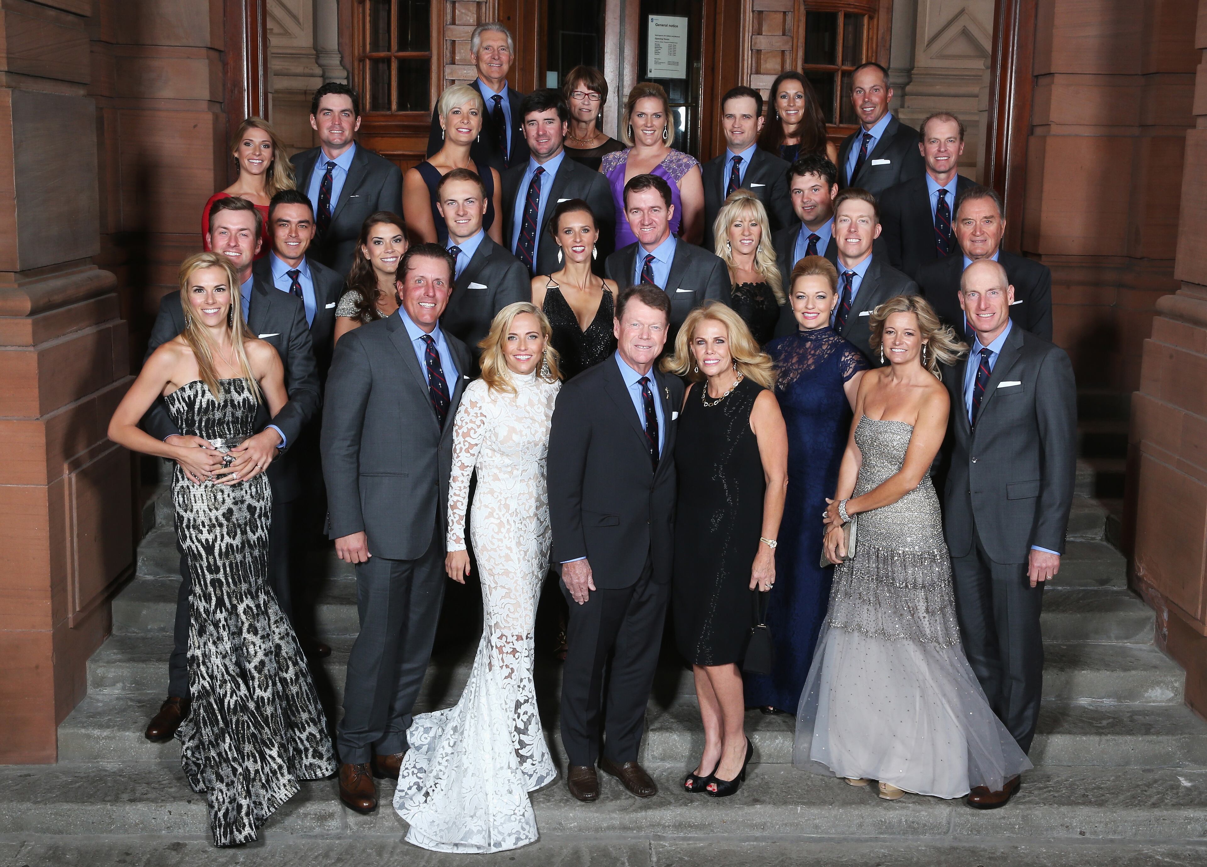 United States Ryder Cup team - Phil Mickelson, Keegan Bradley, vice captain Andy North, Bubba Watson, Matt Kuchar, vice captain Steve Stricker, Rickie Fowler, Jordan Spieth, Patrick Reed, Hunter Mahan, vice captain Raymond Floyd, Webb Simpson, Zach Johnson, Tom Watson, Captain of the United States, Jimmy Walker and Jim Furyk - pose with wives and partners during the 2014 Ryder Cup Gala Dinner at Kelvingrove Art Gallery and Museum.