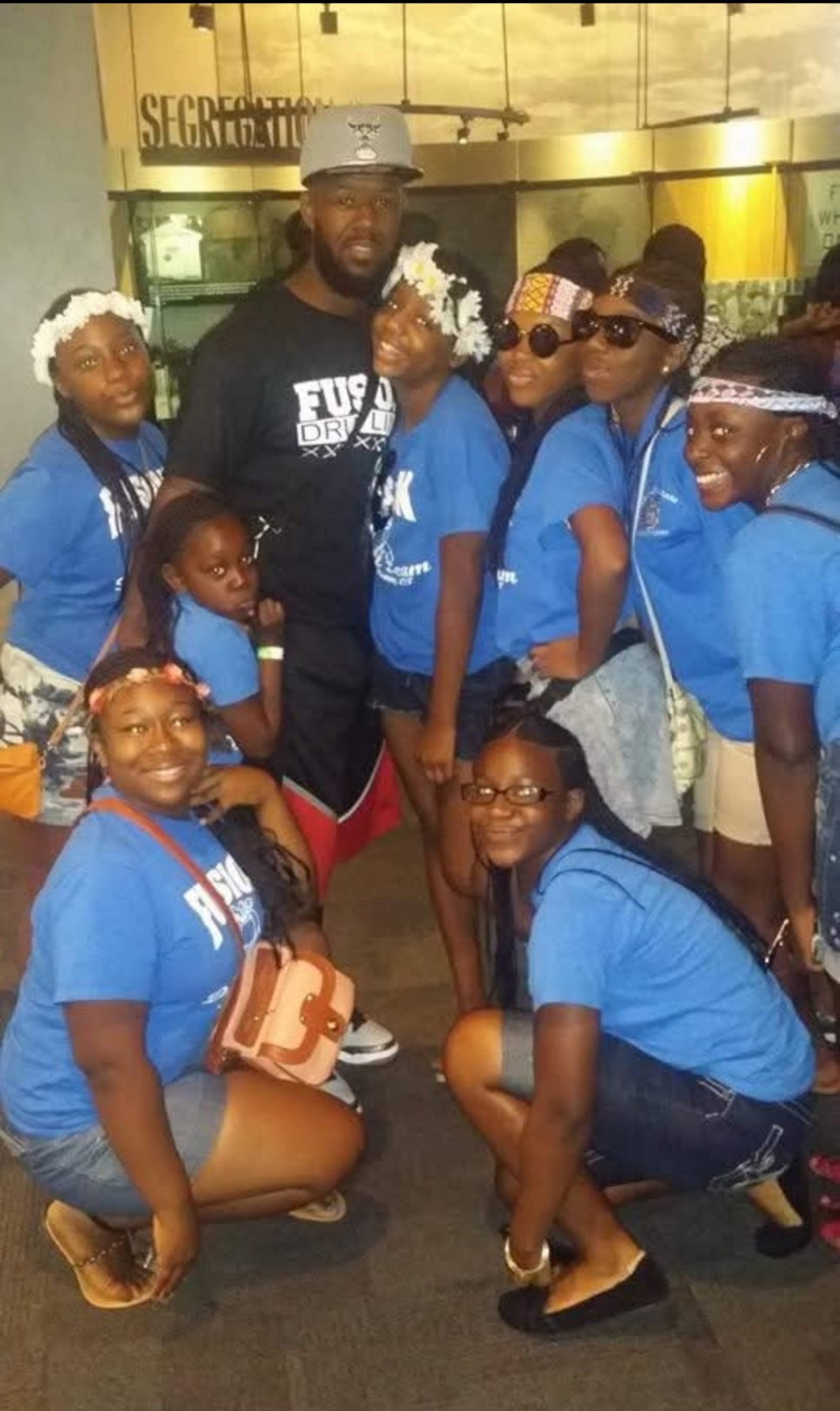 Twelve years ago, drum and drill instructor John Waters (top center in black) brought a group of roughly 70 kids from Connecticut to Atlanta to visit the Martin Luther King Jr. National Historical Site. “It was a surprise from all these kids … when they saw it, they couldn’t believe it," said Waters, who was visiting again Sunday. (Courtesy)