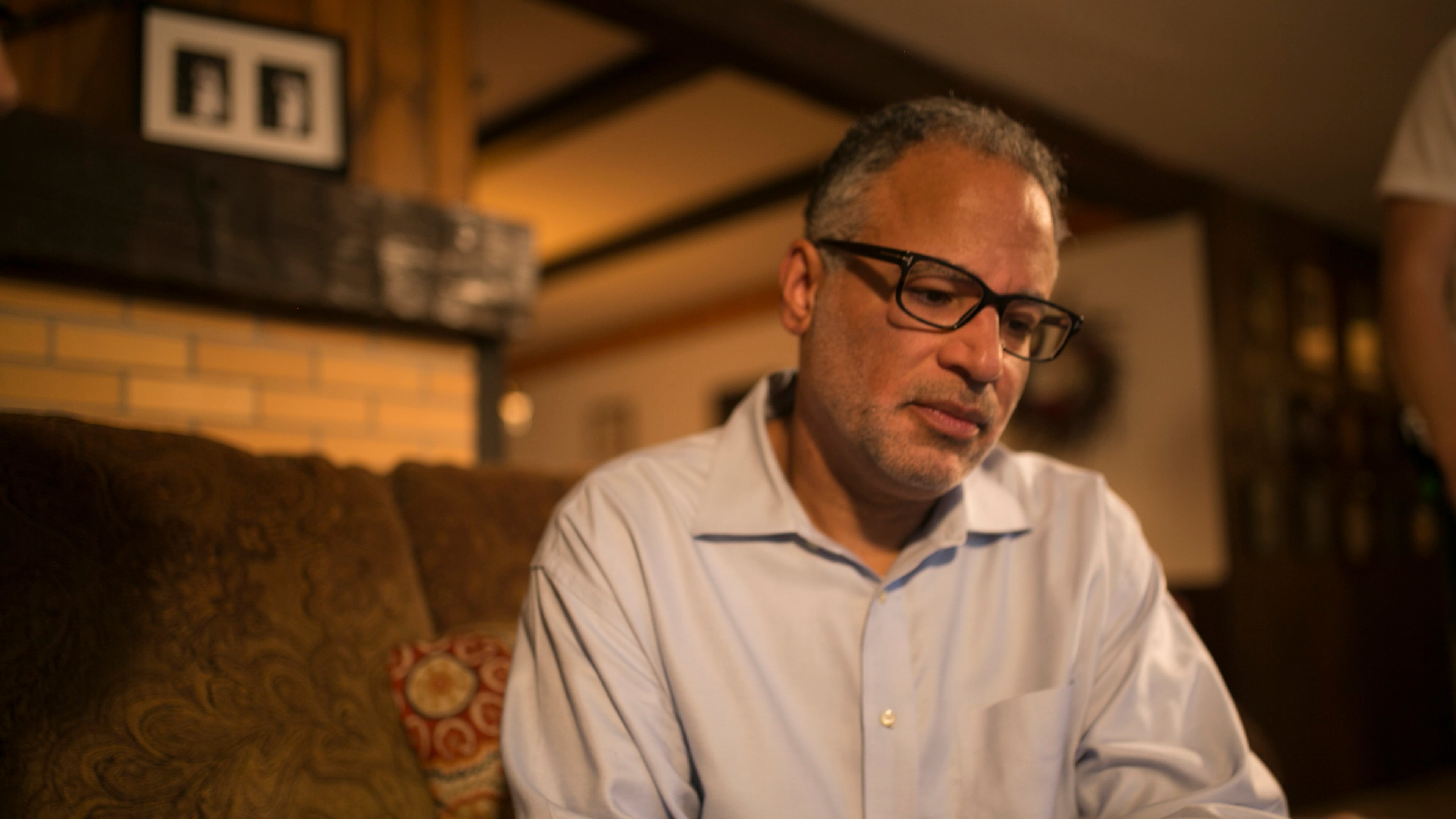 Christian reviews some documents on TLC's "Long Lost Family" episode airing Sunday, April 8, 2018.