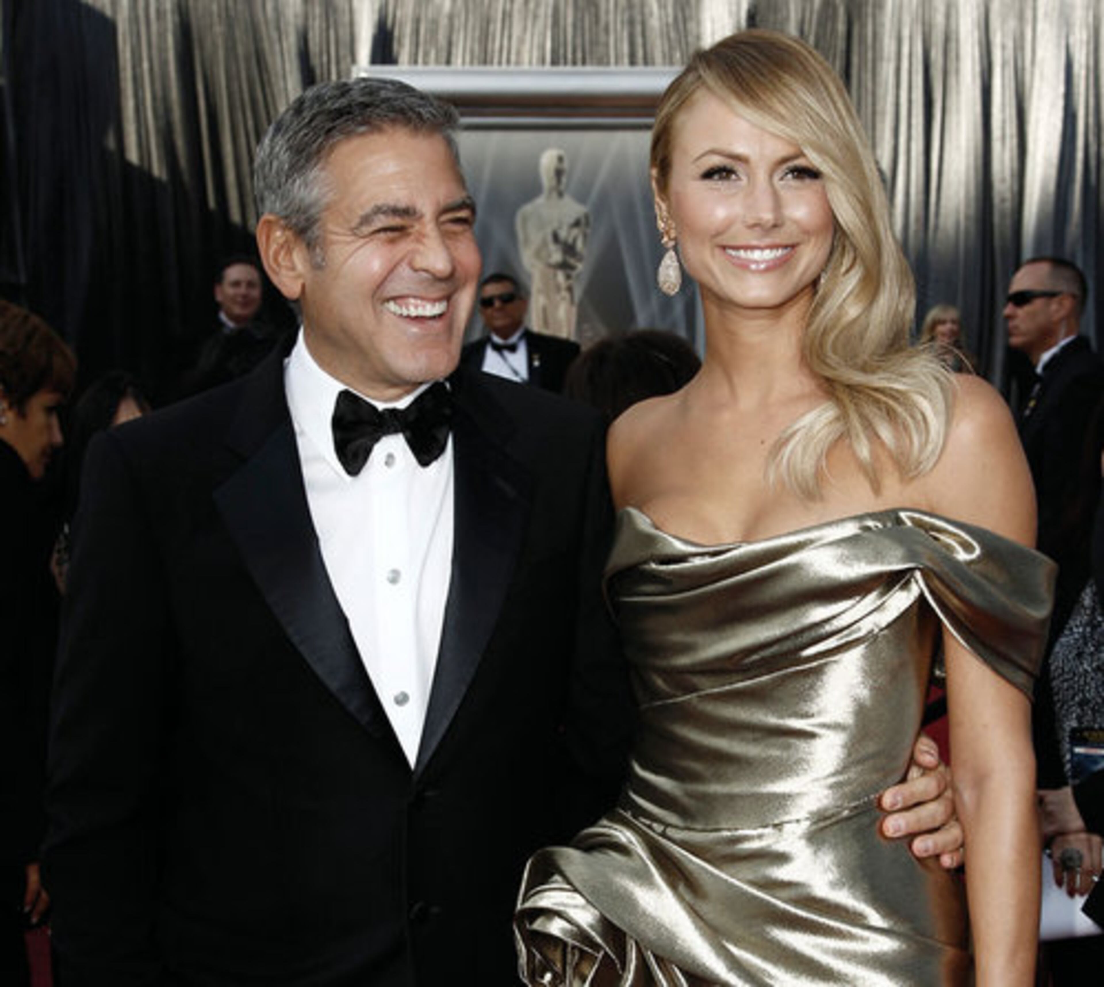 'The Decendants' star George Clooney arrives with and Stacy Keibler.