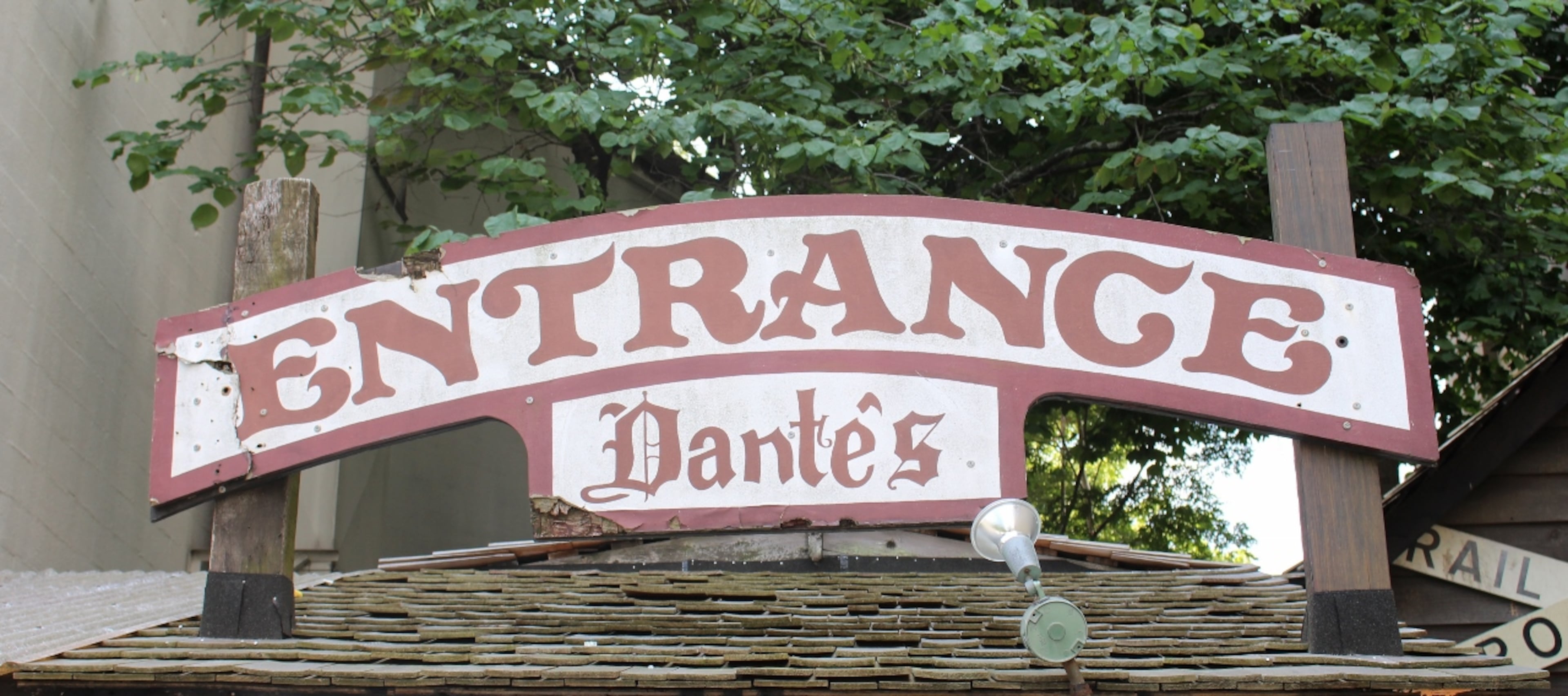 The entrance sign to Dante's Down the Hatch..