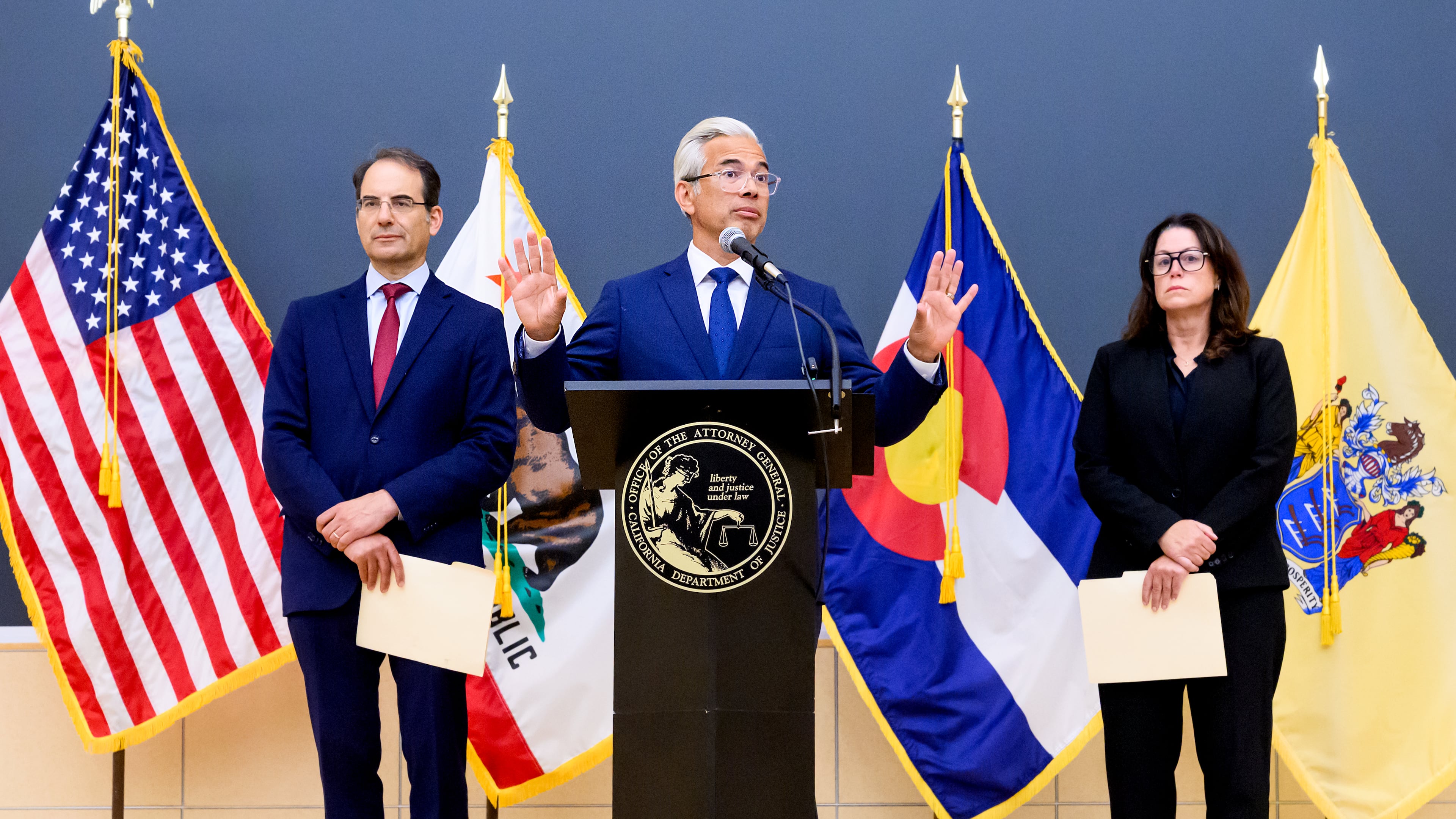 California Attorney General Rob Bonta discusses a lawsuit against Meta during a press conference on Tuesday, Aug. 18, 2026, in Oakland, Calif. Joining him are Colorado Attorney General Philip Weiser, and New Jersey Attorney General Jennifer Davenport. (AP Photo/Noah Berger)