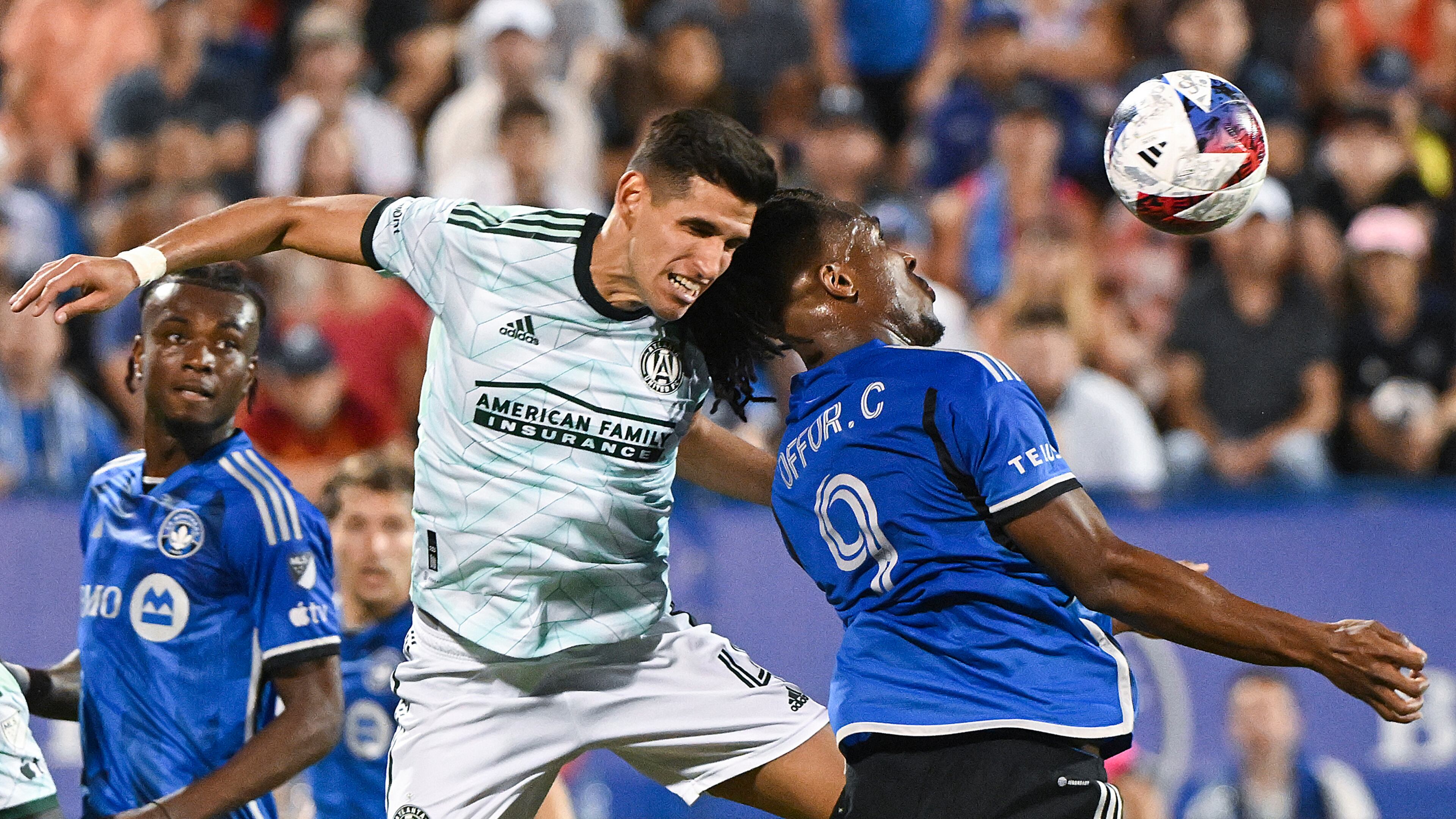 Atlanta United's Luis Abram, left, clears the box as CF Montreal's Chinonso Offor moves in during the second half of an MLS soccer match Saturday, July 8, 2023, in Montreal. (Graham Hughes/The Canadian Press via AP)