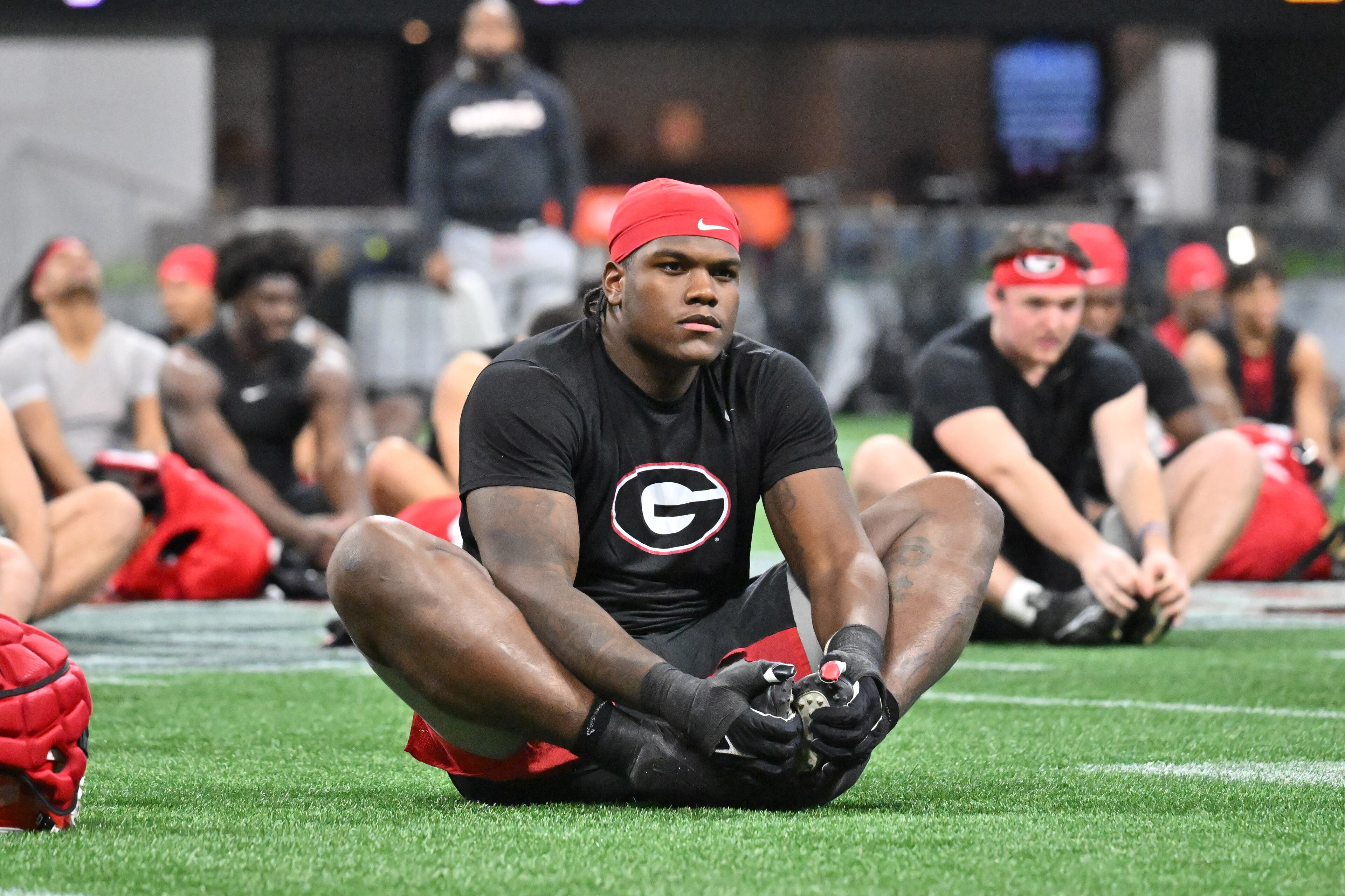 Georgia players stretch during a practice session for the Chick-fil-A Peach Bowl game against Ohio State at the Mercedes-Benz Stadium on Thursday, Dec. 29, 2022, in Atlanta. (Hyosub Shin / Hyosub.Shin@ajc.com)