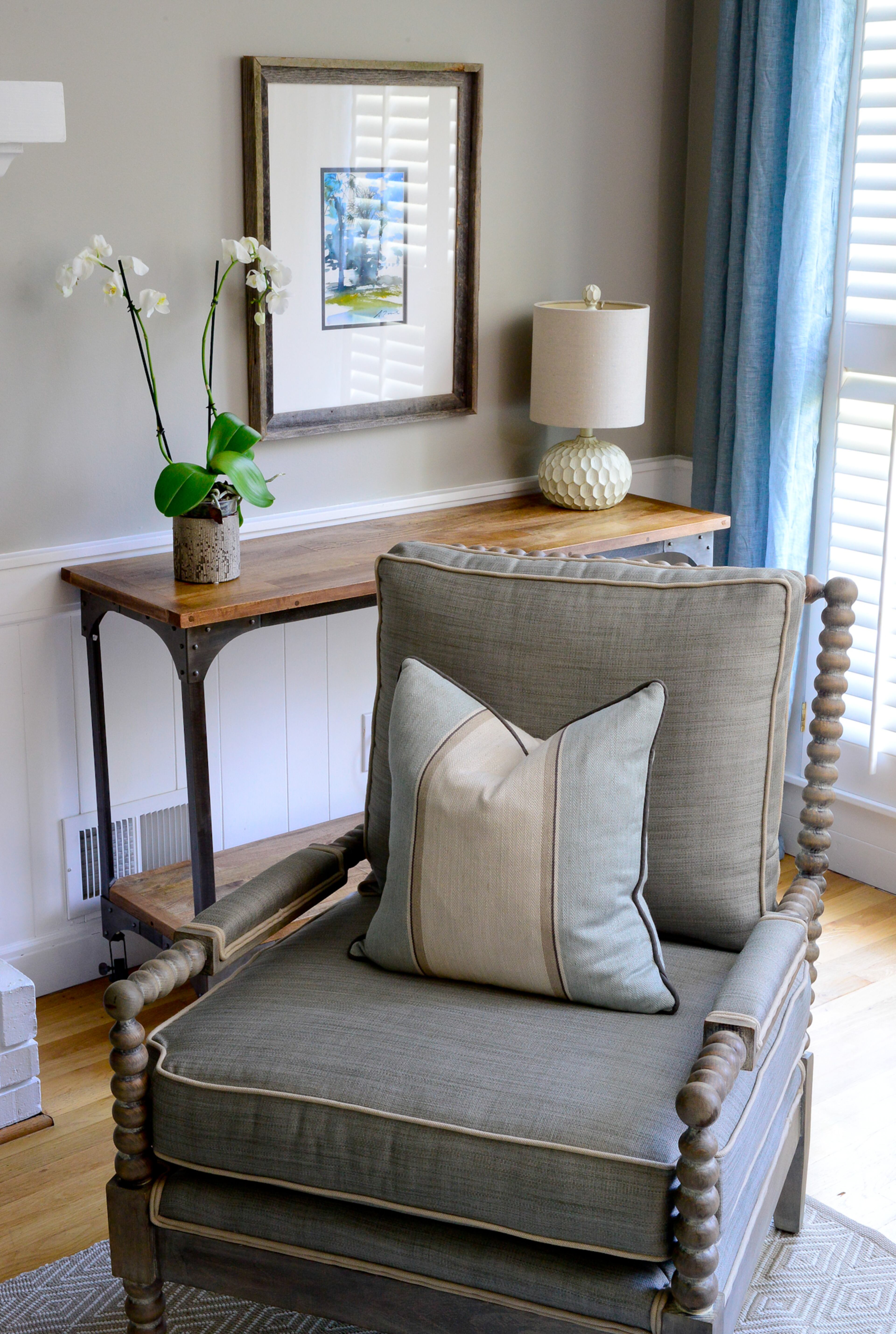 Upholstered spindle chairs from DR Kinkaid have the added benefit of being on casters (with custom pillows by Lauren Harris Interiors). The homeowners can change the configuration of the room depending on the number of guests.