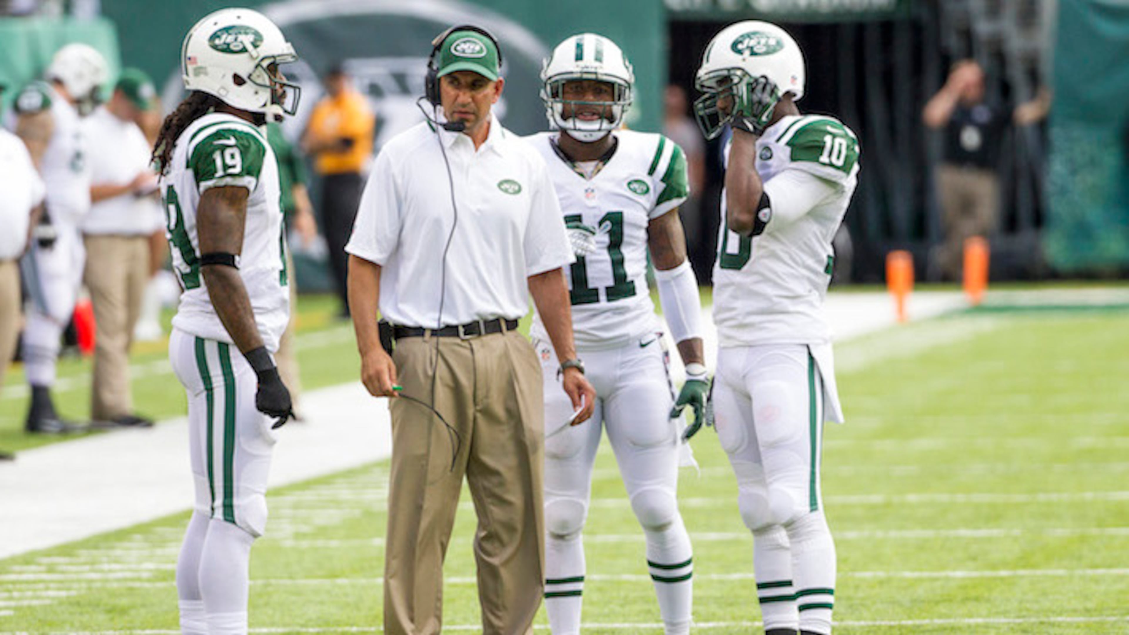 Sanjay Lal looks on with New York Jets wide receivers Clyde Gates, Jeremy Kerley and Santonio Holmes, during a game against the Tampa Bay Buccaneers on September 8, 2013 at MetLife Stadium in East Rutherford, N.J. (Christopher Szagola/Cal Sport Media/Zuma Press/TNS)