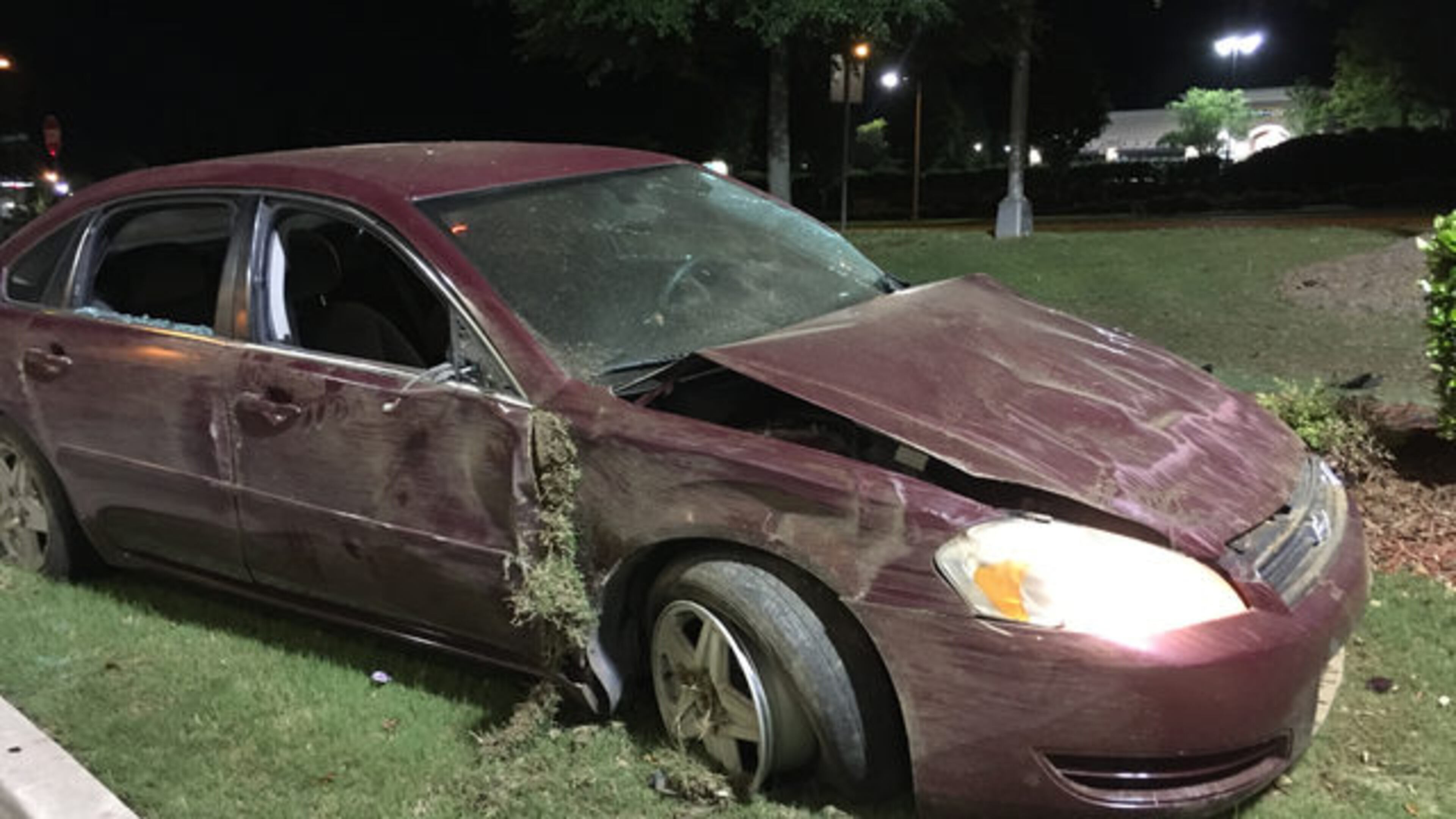 A man accused of shooting at a popular East Point club crashed into a tree. (Credit: Channel 2 Action News)