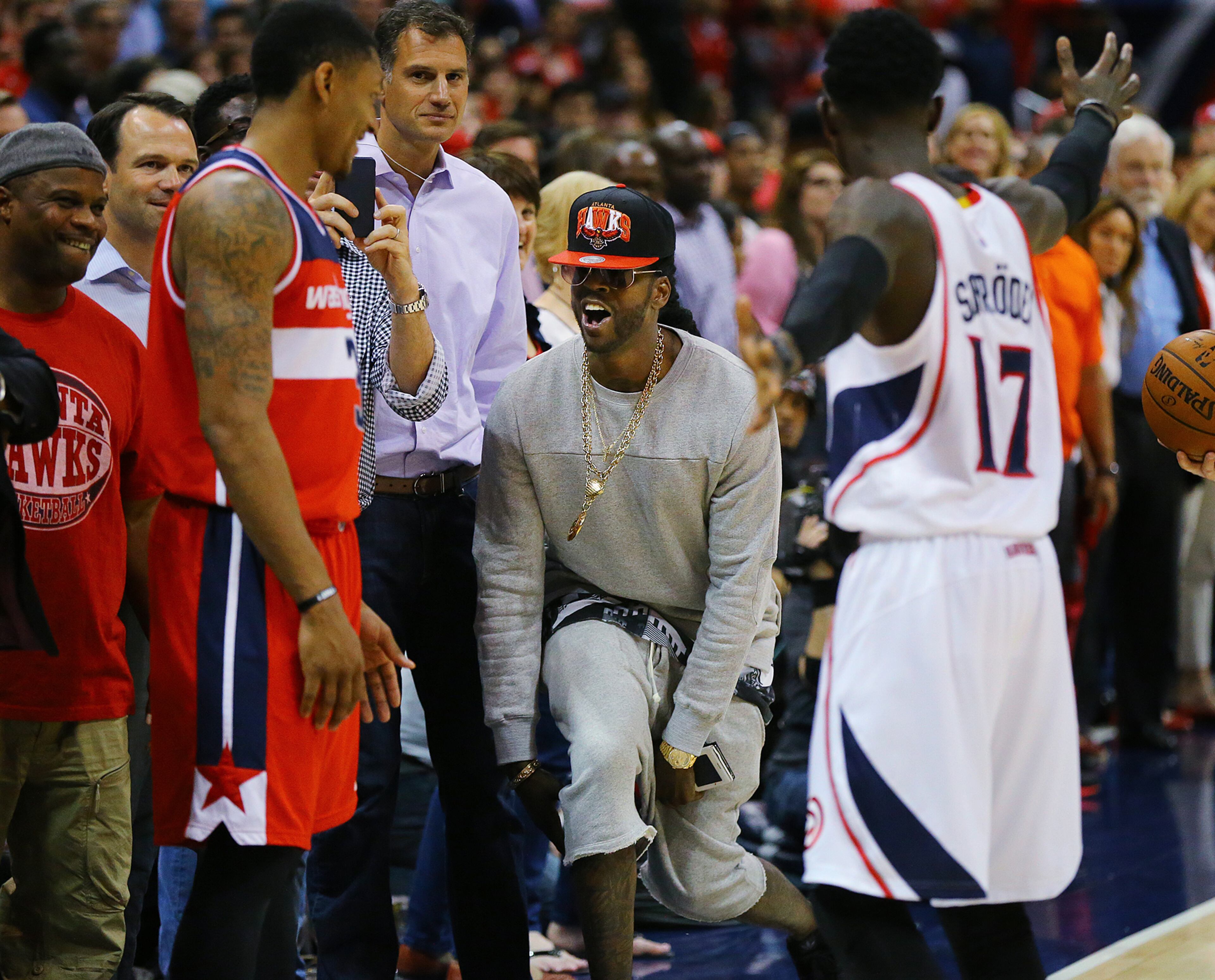American rapper 2 Chainz taunts Wizards guard Bradley Beal from his seat as he prepares to inbounds the ball in the final minute of a Hawks 82-81 victory in their Eastern Conference Semifinals game 5 on Tuesday, May 13, 2015, in Atlanta. Curtis Compton / ccompton@ajc.com
