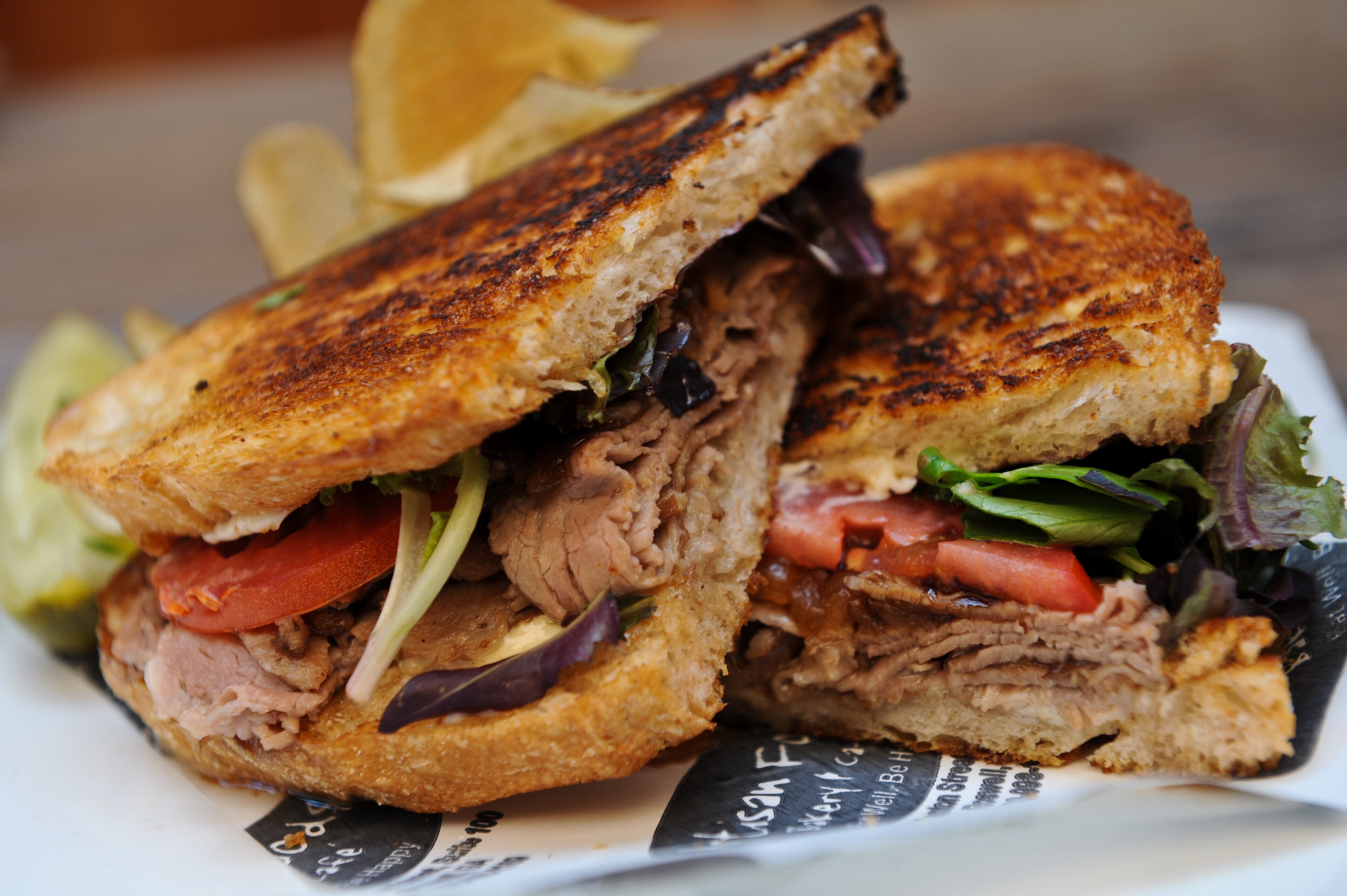 How to use this restaurant: A great place to meet friends for breakfast, lunch or weekend brunch. Go for the freshly baked breads like challah, baguettes and pastries. What to try: The new “Burger and Beignet” nights Thursdays through Saturdays. Best seat in the house: Located down the street from the center of the historic district, you can grab a quiet spot inside or out. Pictured here: Roasted Lamb sandwich: mixed lettuce, vine ripe tomatoes, caramelized onion, balsamic vinaigrette on toasted sourdough with a side of pasta salad. (BECKY STEIN/SPECIAL) Artisan Foods Bakery & Cafe, 1169 Canton St., Roswell. 770-998-1169, www.artisanfoodsbakery.com.