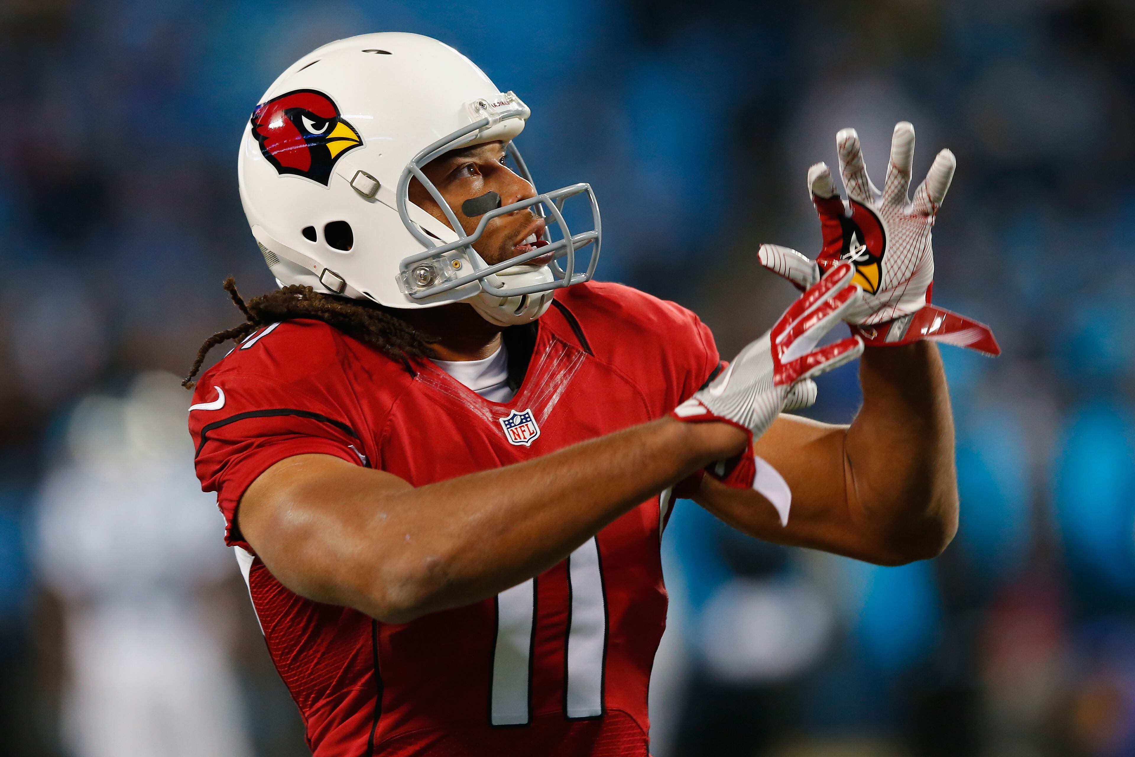 CHARLOTTE, NC - JANUARY 24: Larry Fitzgerald #11 of the Arizona Cardinals warms up prior to the NFC Championship Game against the Carolina Panthers at Bank of America Stadium on January 24, 2016 in Charlotte, North Carolina. (Photo by Kevin C. Cox/Getty Images)