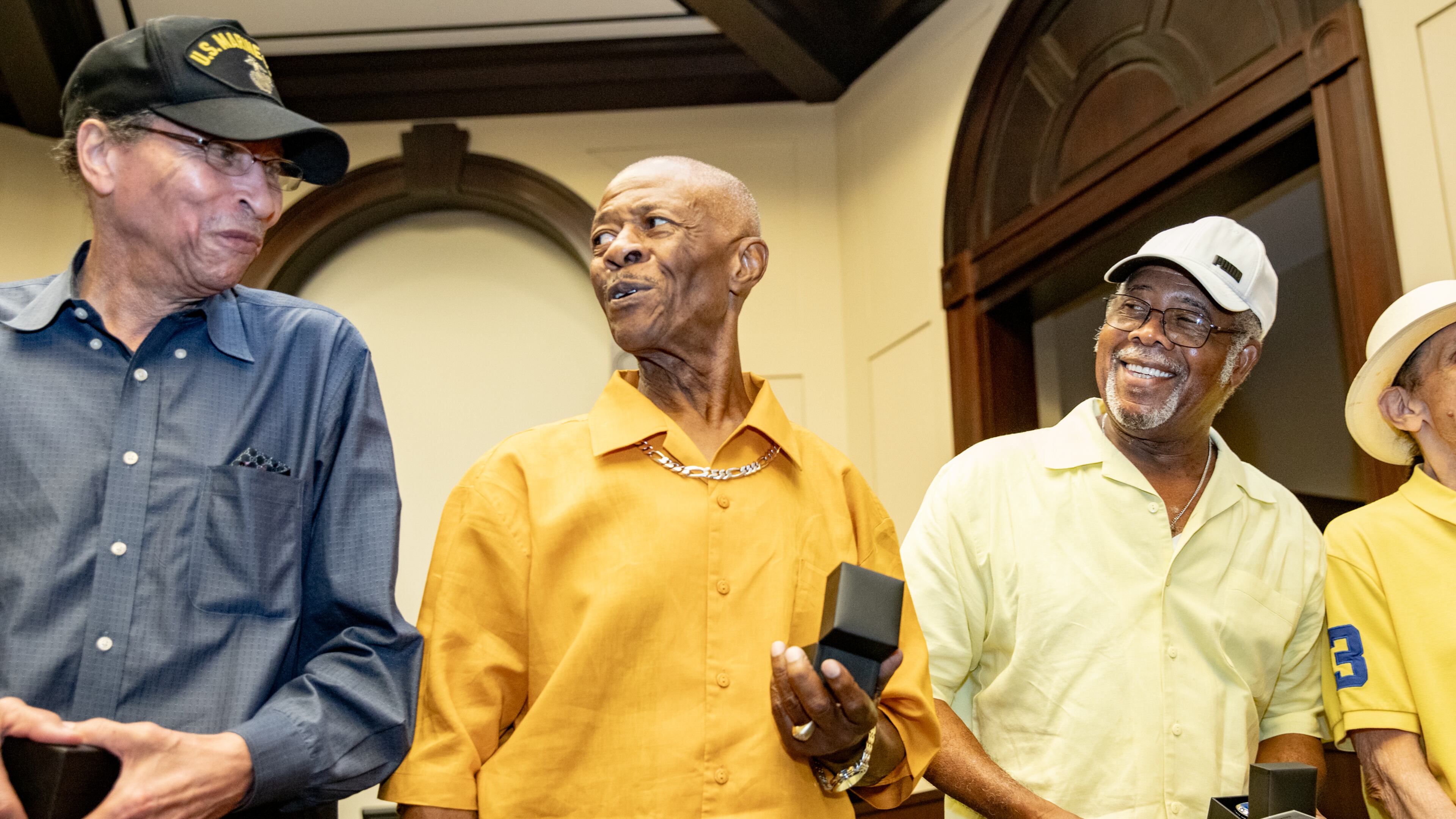 The Bailey-Johnson High School's basketball team of 1964-65, including James Emerson, Jimmy Taylor and David Taylor, receive their State Championship rings on Monday, July 17, 2023 at Alpharetta City Hall during a city council meeting. (Jenni Girtman for The Atlanta Journal-Constitution)