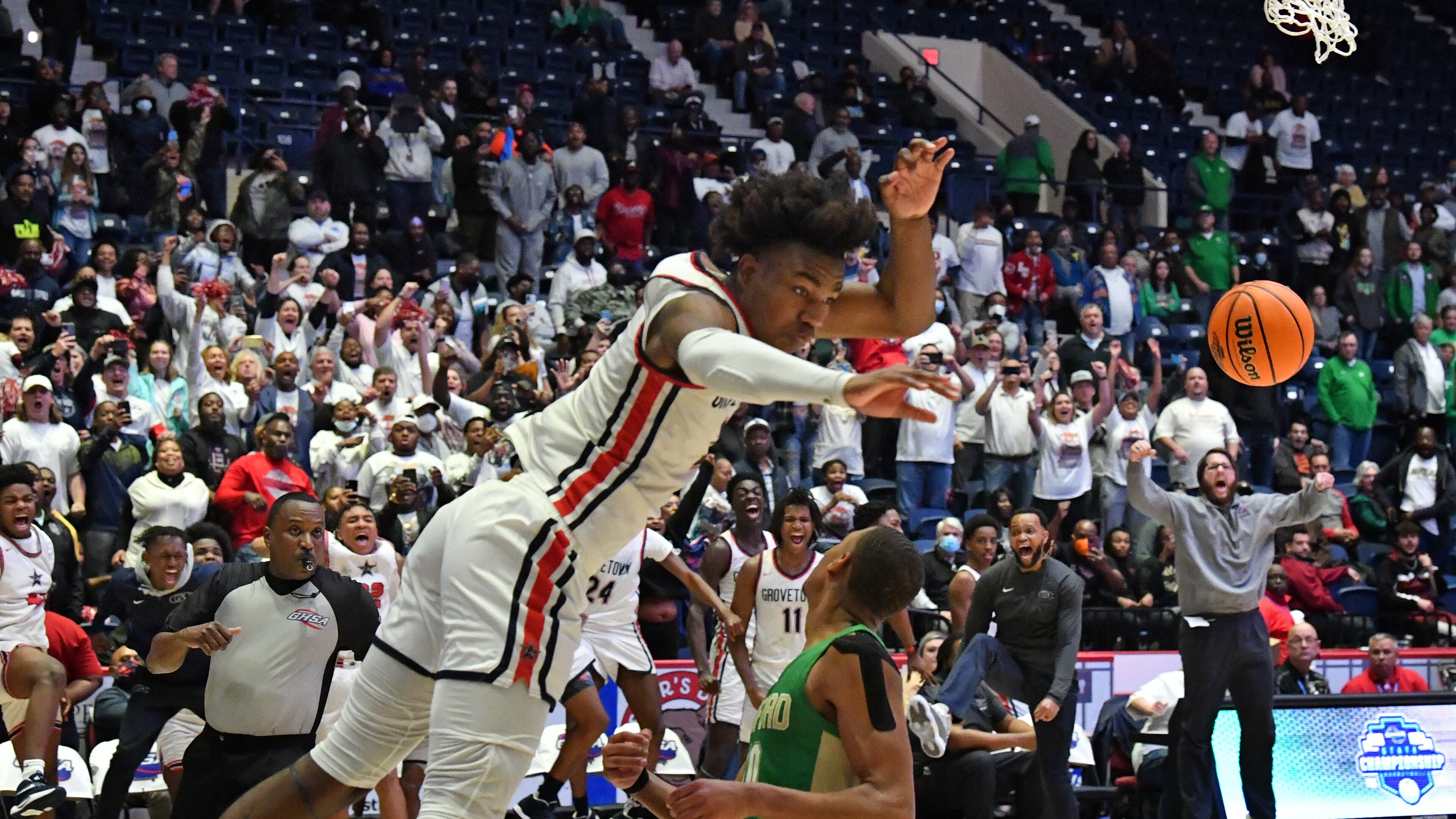 March 11, 2022 Macon - Grovetown's Frankquon Sherman (2) dunks the ball at the end of the 4th quarter during the 2022 GHSA State Basketball Class AAAAAA Boys Championship game at the Macon Centreplex in Macon on Friday, March 11, 2022. Grovetown won 66-59 over Buford. (Hyosub Shin / Hyosub.Shin@ajc.com)