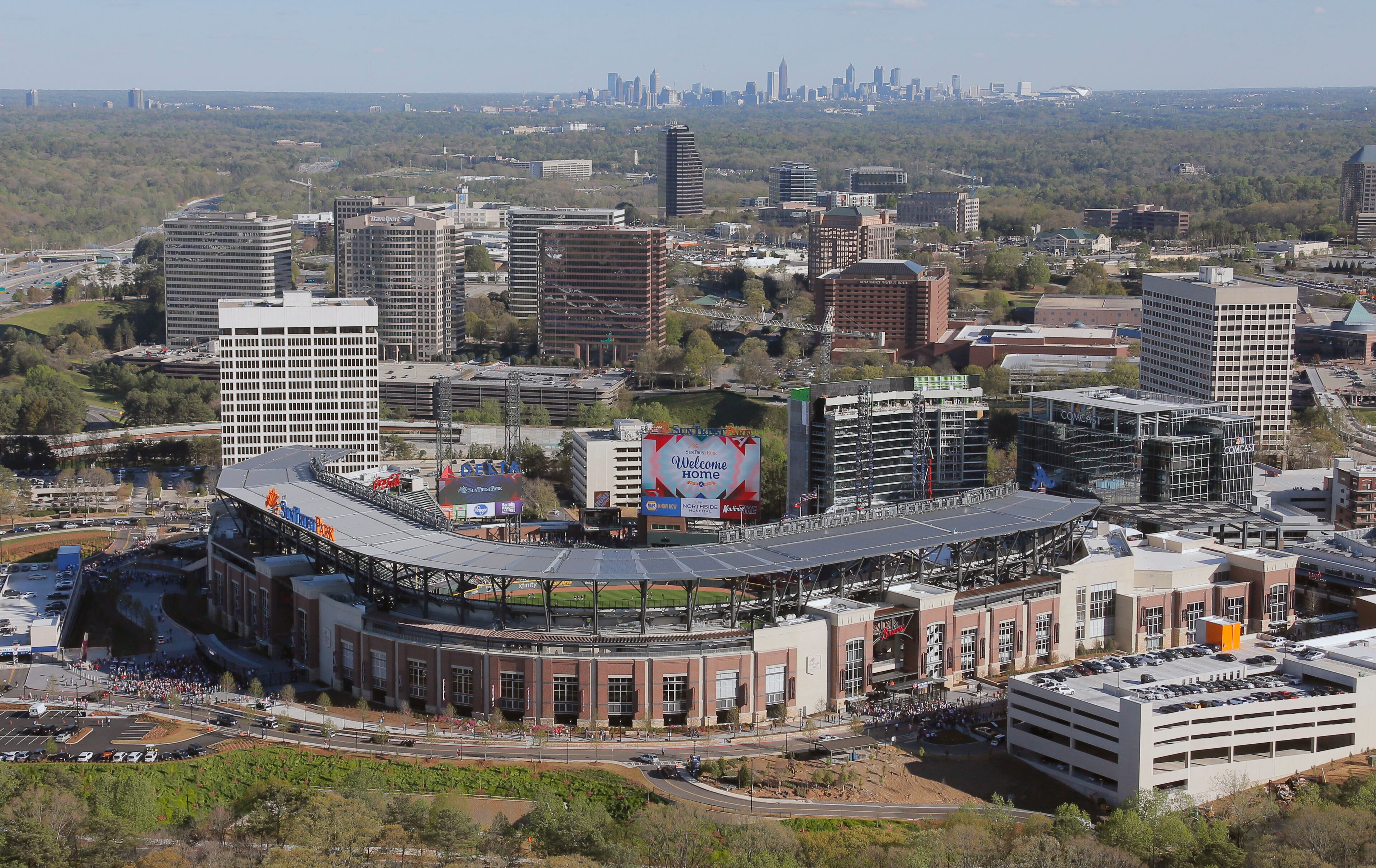 Mar. 31, 2017 - Atlanta - View of SunTrust park looking south with downtown Atlanta in the background. The Braves open their new stadium the day after a massive fire destroyed a section of I-85 in downtown Atlanta. BOB ANDRES /BANDRES@AJC.COM