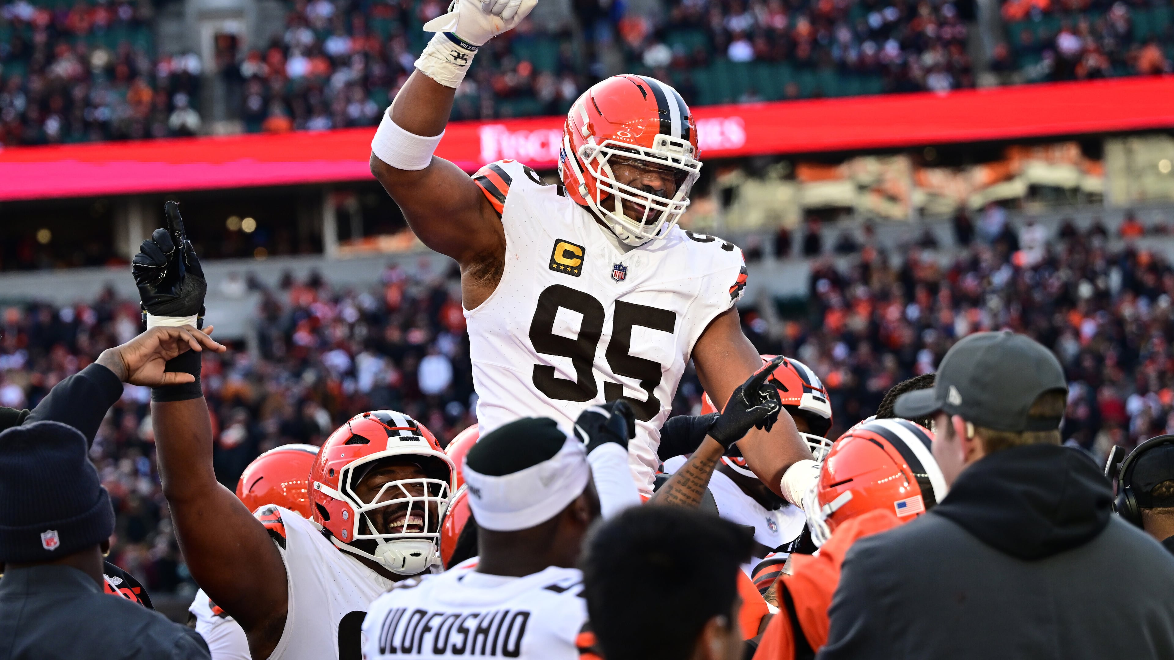 FILE - Cleveland Browns defensive end Myles Garrett, center, celebrates with teammates after breaking the NFL single season sack record during the second half of an NFL football game against the Cincinnati Bengals in Cincinnati, Jan. 4, 2026. (AP Photo/David Dermer, File)