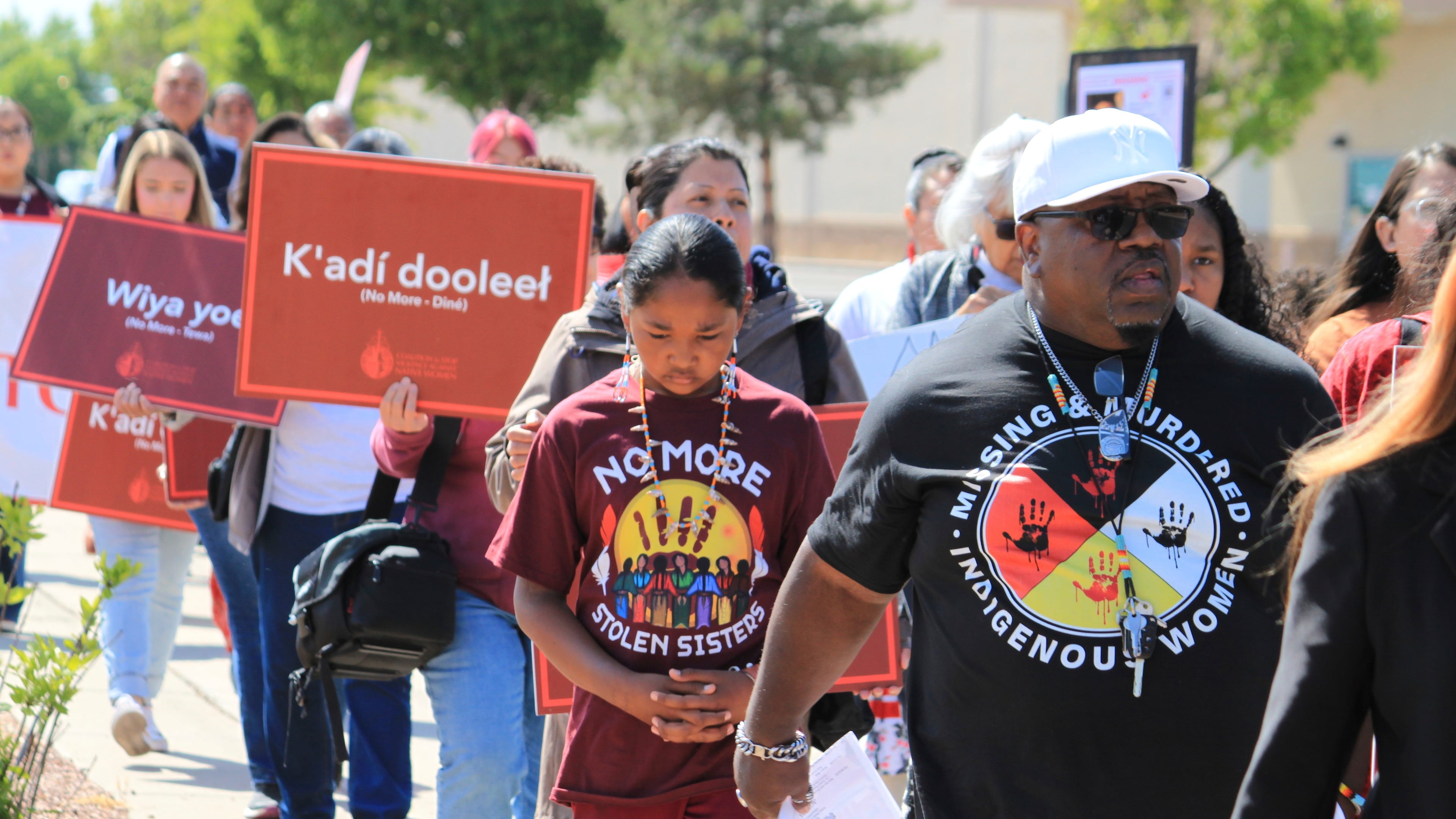 FILE - Tize W. Clark, right and his son, Zion Clark, participate in a walk to honor Native American and Indigenous relatives who have gone missing or have been killed as Missing and Murdered Indigenous Persons Awareness Day is marked in Albuquerque, New Mexico, on May 5, 2025. (AP Photo/Susan Montoya Bryan,File)