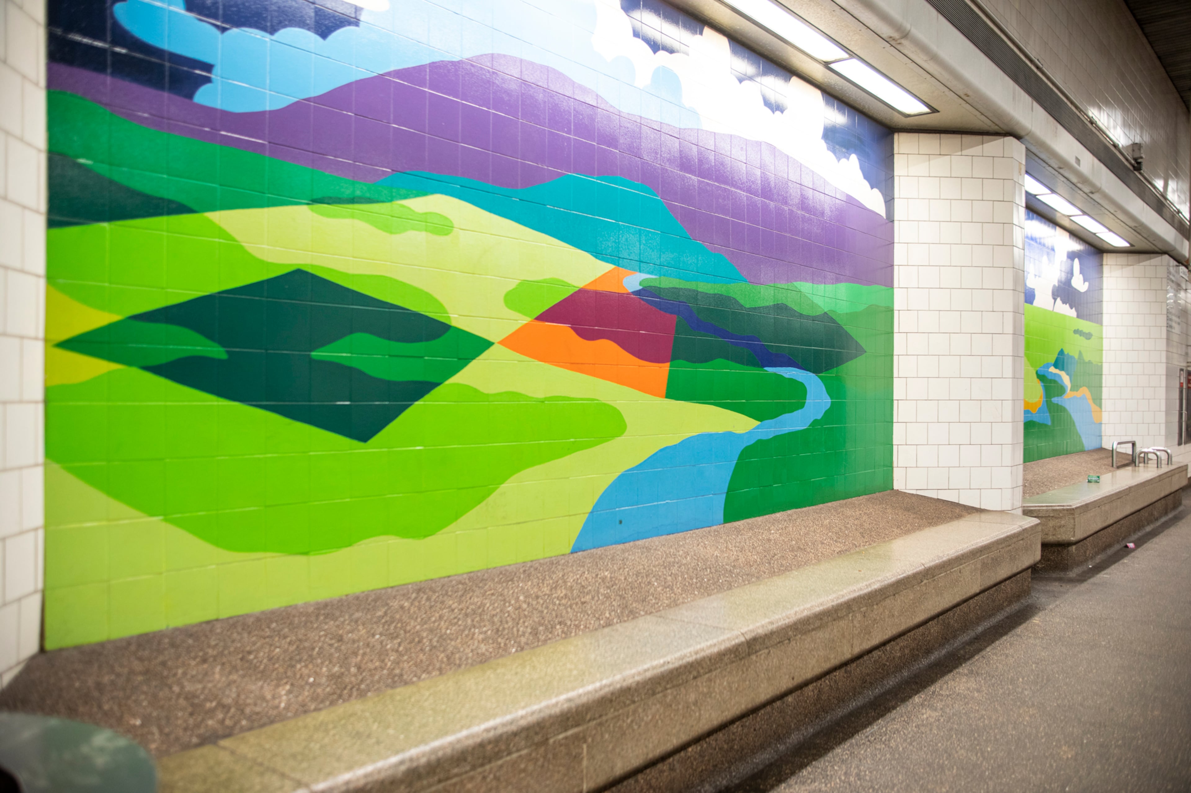 Landscape murals by Gordon Anderson greet passengers at the North Avenue MARTA Station platform. “I wanted the commuters to experience the distorted sensations of a pilot flying into the (station),” Anderson says.
(Courtesy of MARTA)