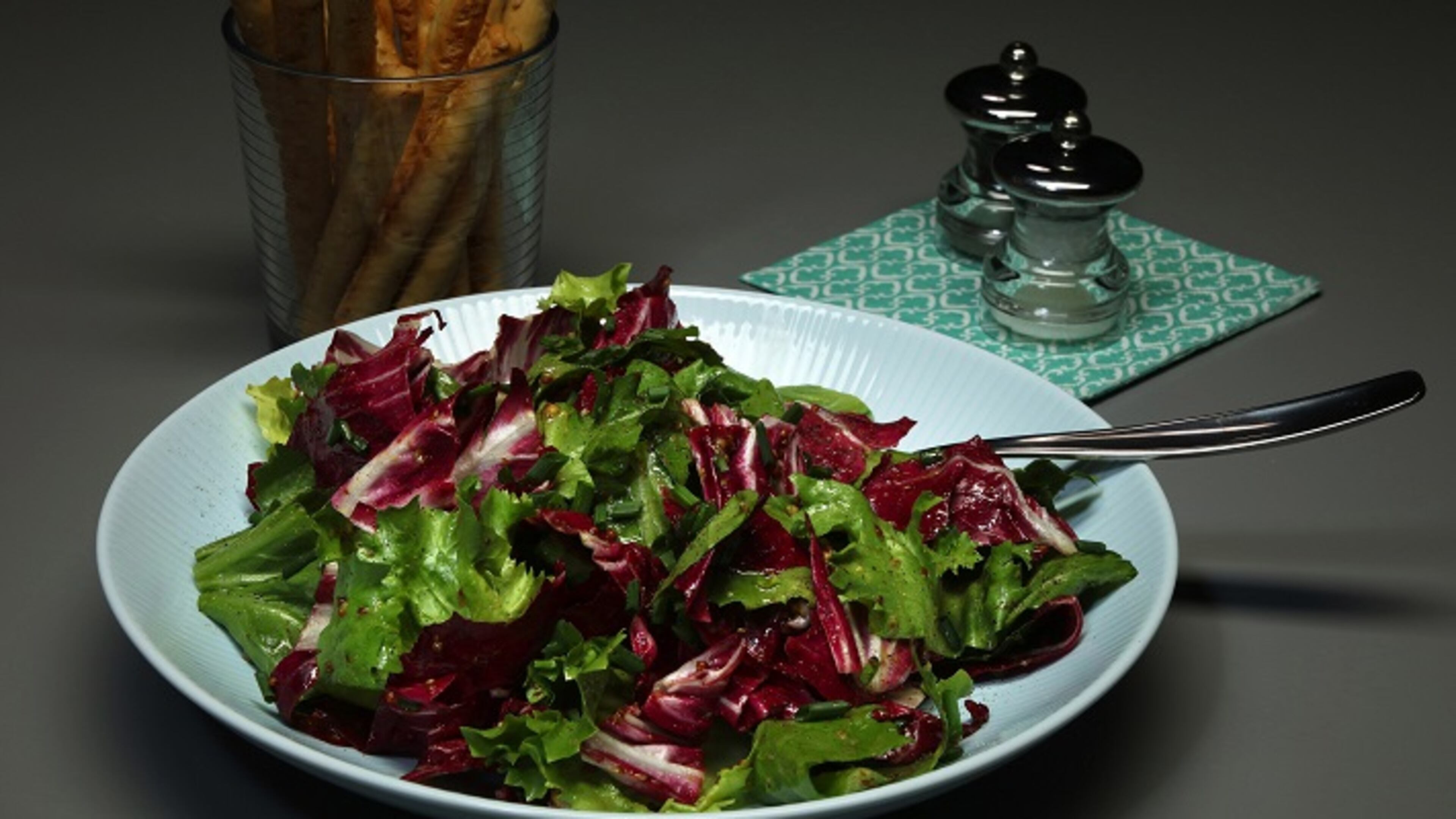 Honey and mustard flavor a sweet-tart vinaigrette that balances the bitter notes in the chicories. (Terrence Antonio James/Chicago Tribune/TNS)