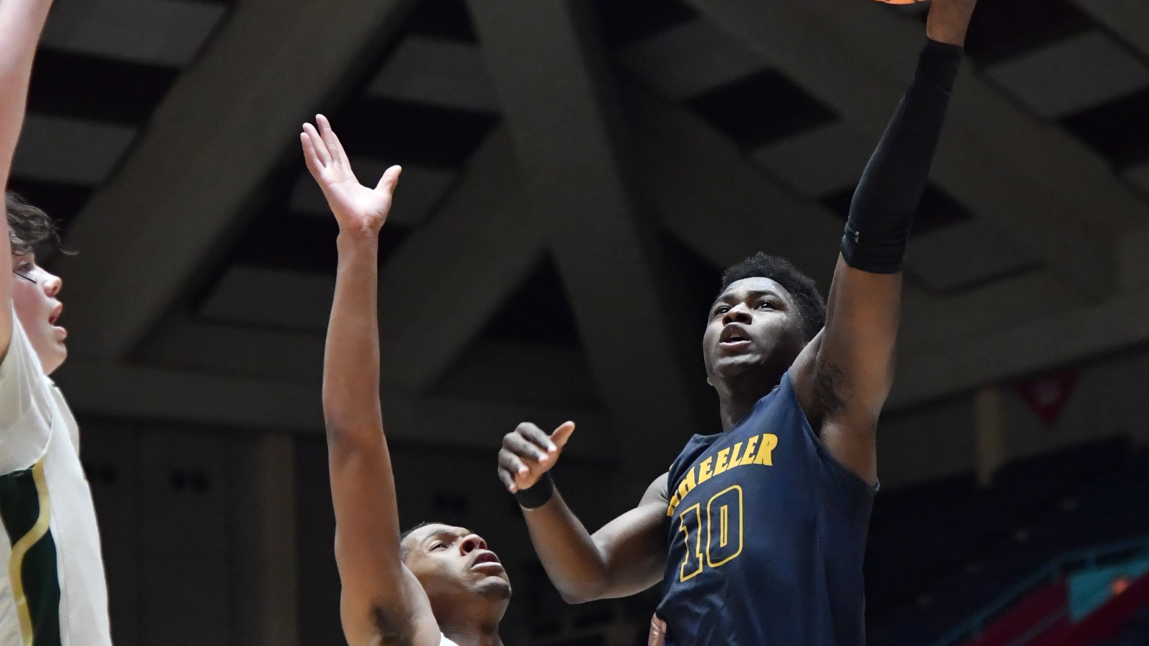Wheeler's Nash Kelly (10) shoots over Grayson's Josh Smith (3) during 2020 GHSA State Basketball Class Championship game at the Macon Centreplex in Macon on Saturday, March 7, 2020. Wheeler won 60-59 over Grayson. (Hyosub Shin / Hyosub.Shin@ajc.com)
