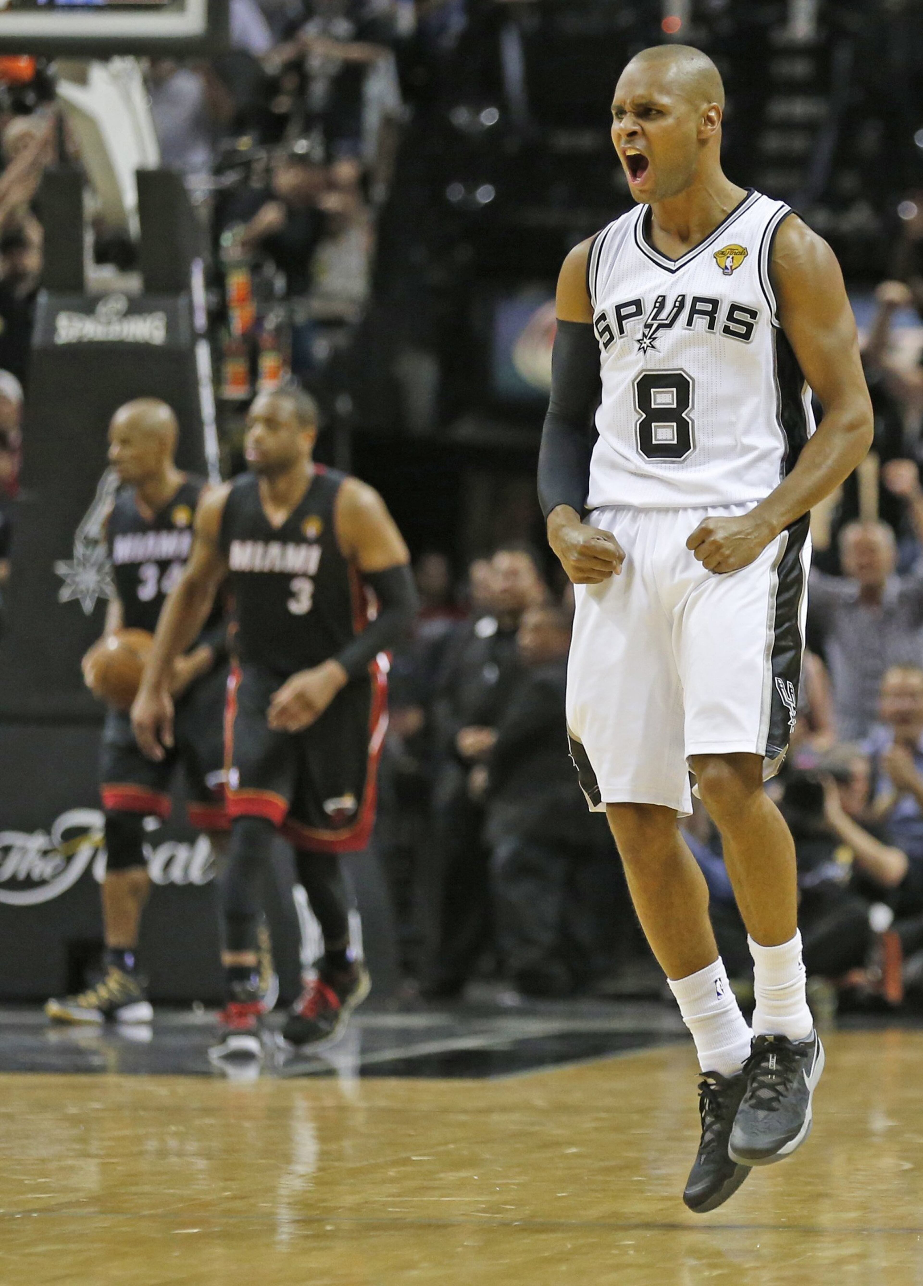 San Antonio Spurs Patty Mills celebrates hitting a three pointer in the third quarter in Game 5 of the NBA Finals at the AT&T Center in San Antonio, Texas, on Sunday, June 15, 2014. (Al Diaz/Miami Herald/MCT)