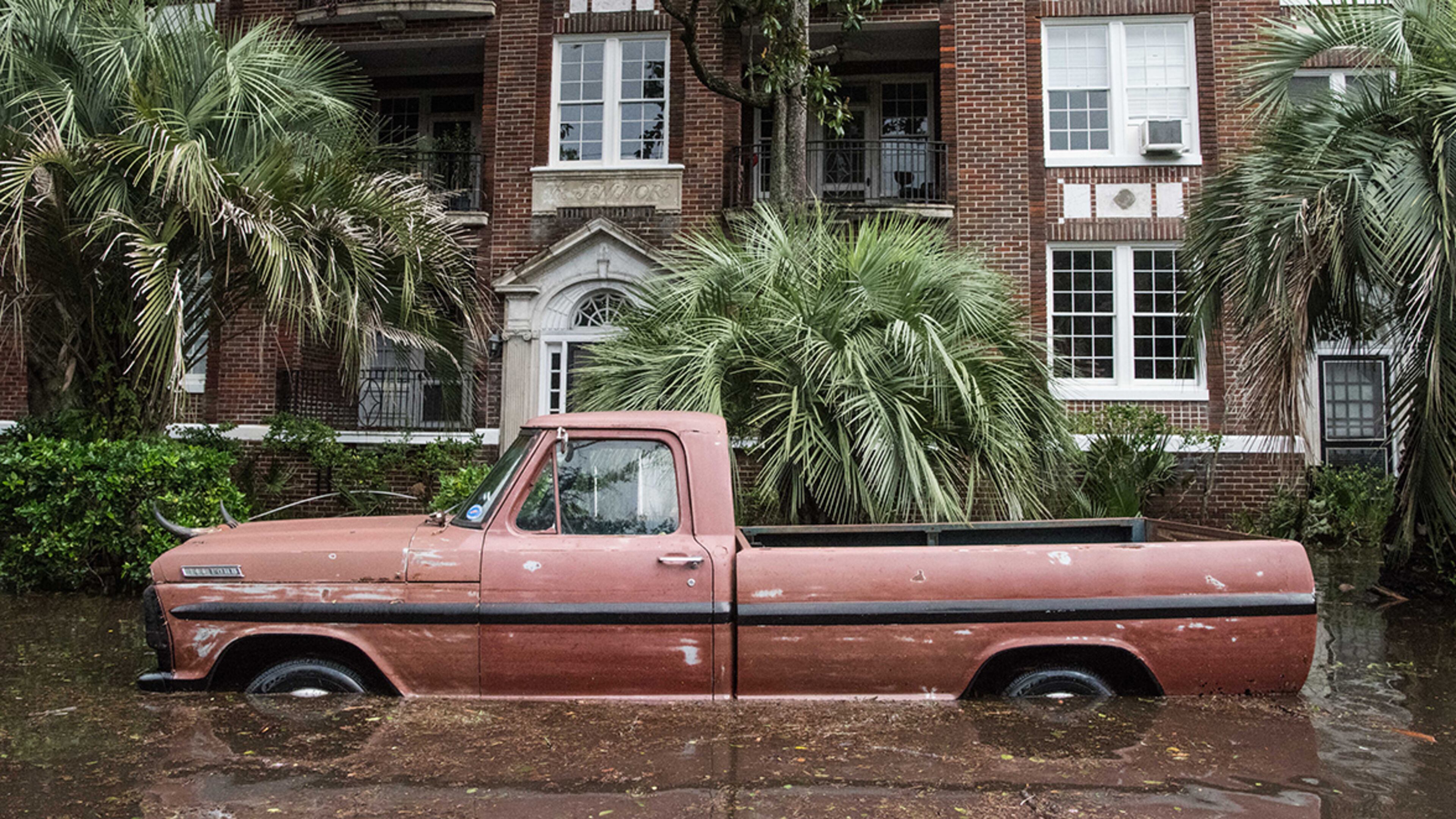JACKSONVILLE, FL - SEPTEMBER 11: A pickup truck is inundated by storm surge flood waters from Hurricane Irma along the St. Johns River in the Five Points neighborhood Sept. 11, 2017 in Jacksonville, Florida. Flooding in downtown Jacksonville along the river topped a record set during Hurricane Dora in 1965. (Photo by Sean Rayford/Getty Images)