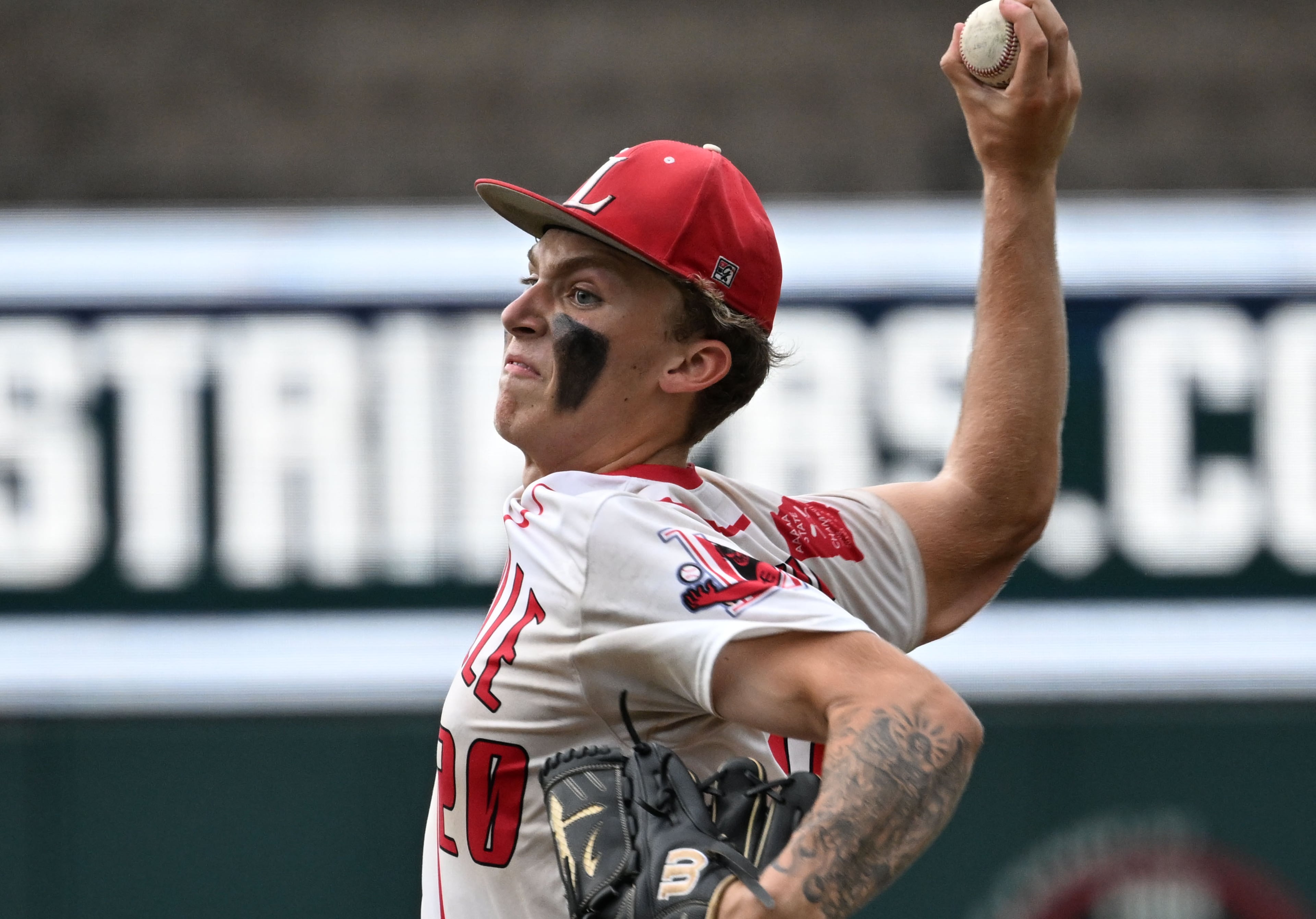Loganville's Jake Boland throws a pitch during the sixth inning of Game 1 of the GHSA Class 5A baseball state championship series Monday, May 25, 2026, at Gwinnett Field in Lawrenceville. (Hyosub Shin/AJC)