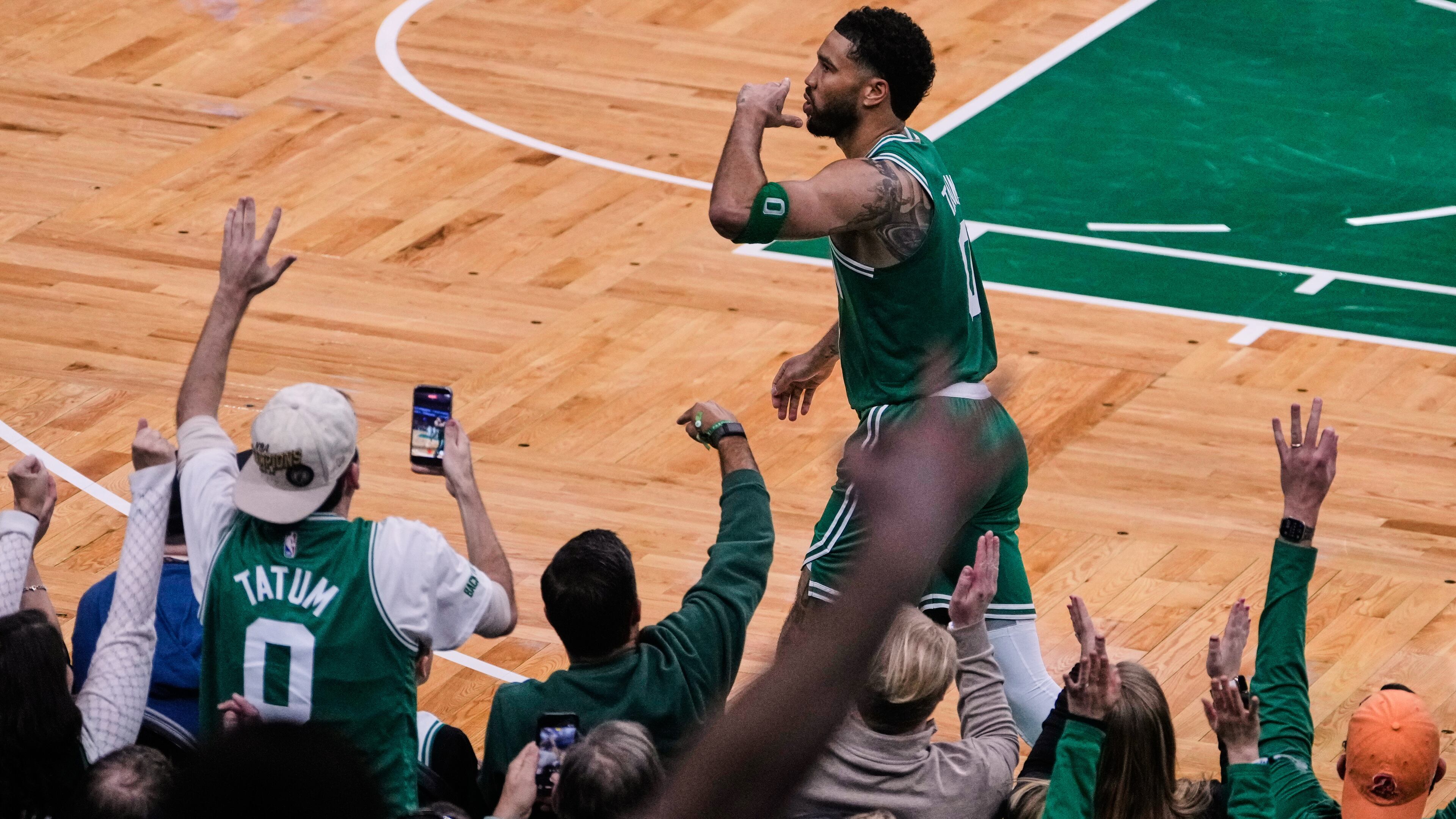 Boston Celtics forward Jayson Tatum blows a kiss to fans after making a 3-pointer against the Dallas Mavericks during the second half of an NBA basketball game, Friday, March 6, 2026, in Boston. (AP Photo/Charles Krupa)
